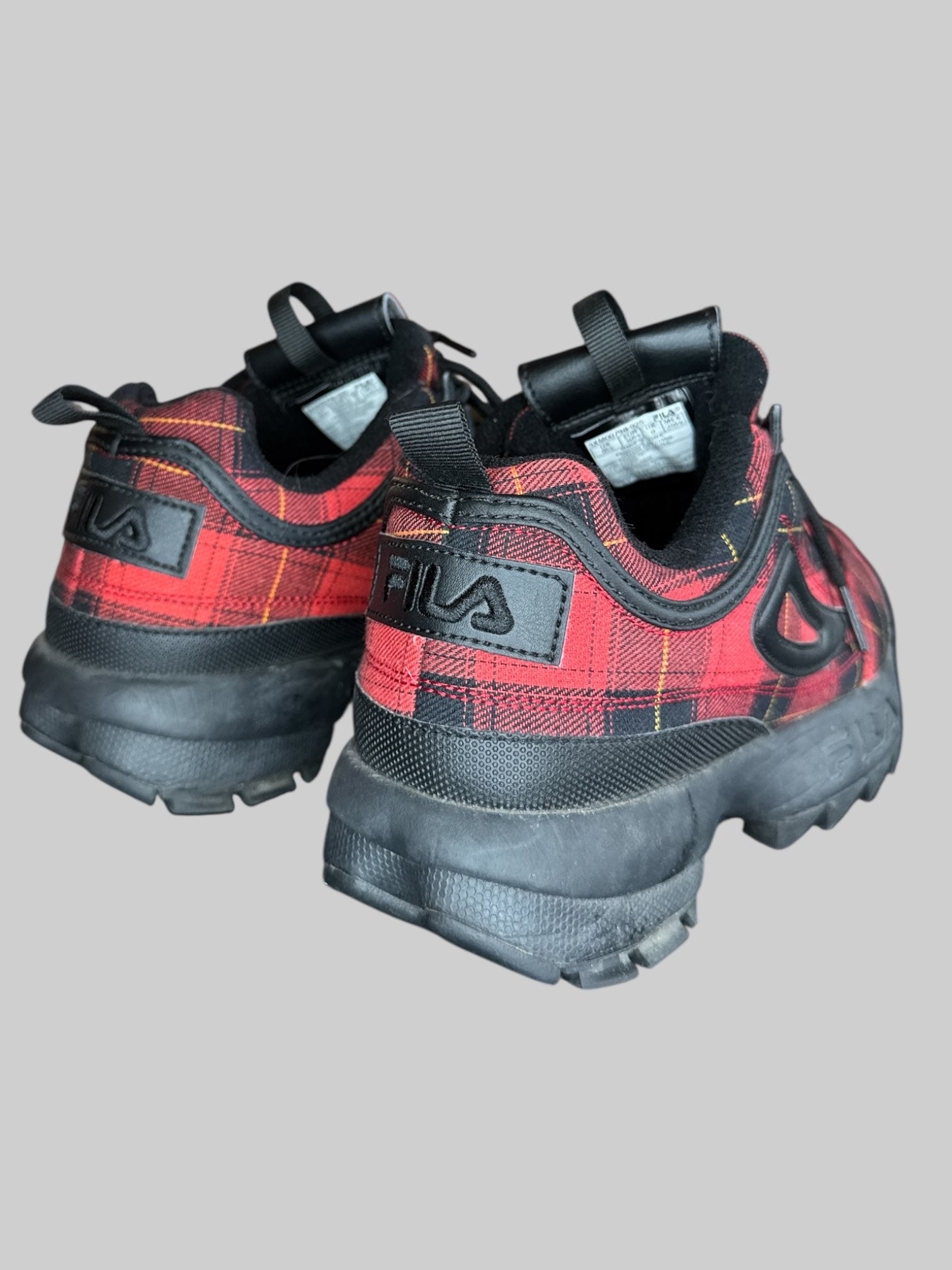 Size 8.5 black red and yellow plaid Fila sneakers