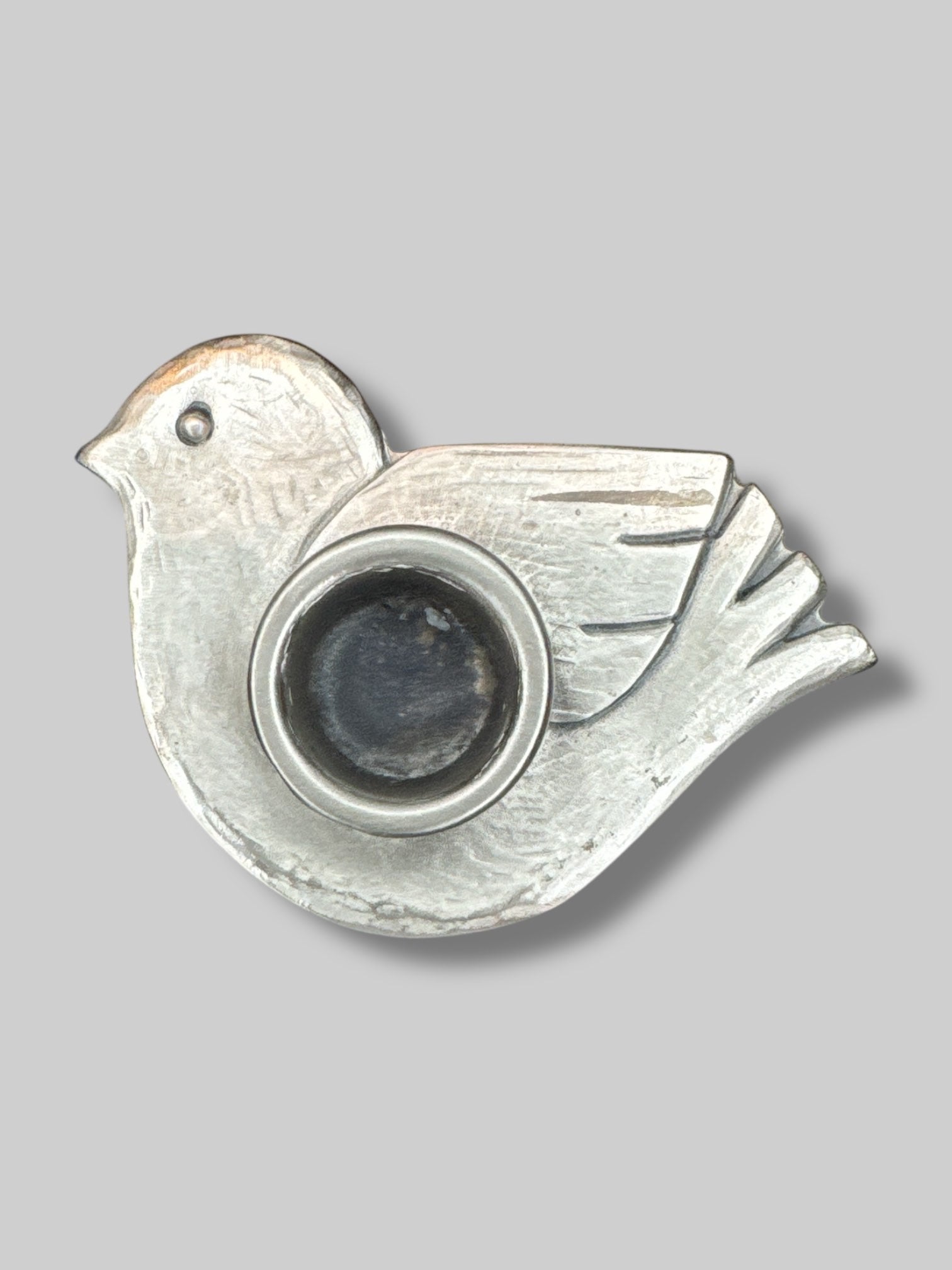 Pewter bird shaped candle holder