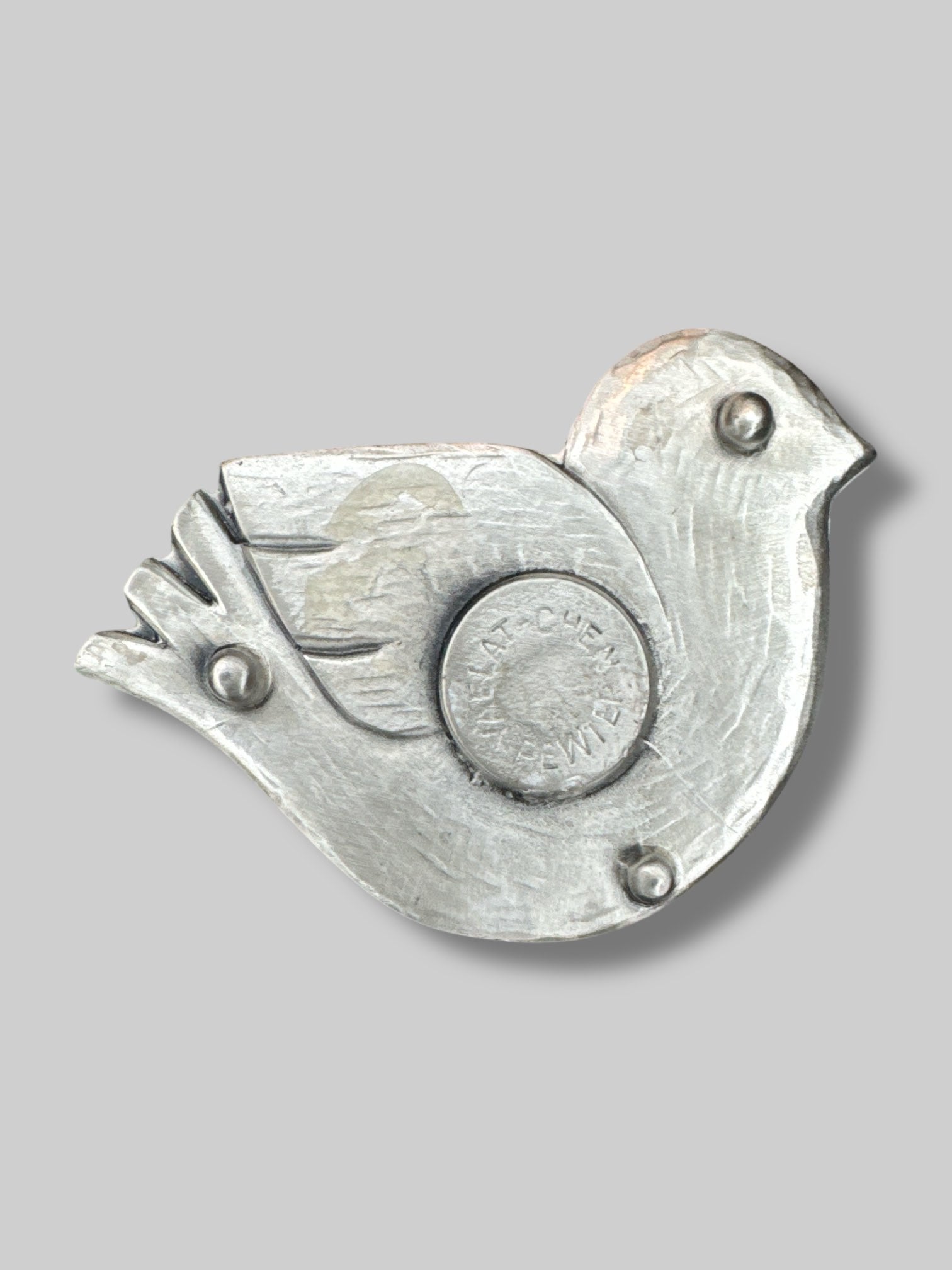 Pewter bird shaped candle holder