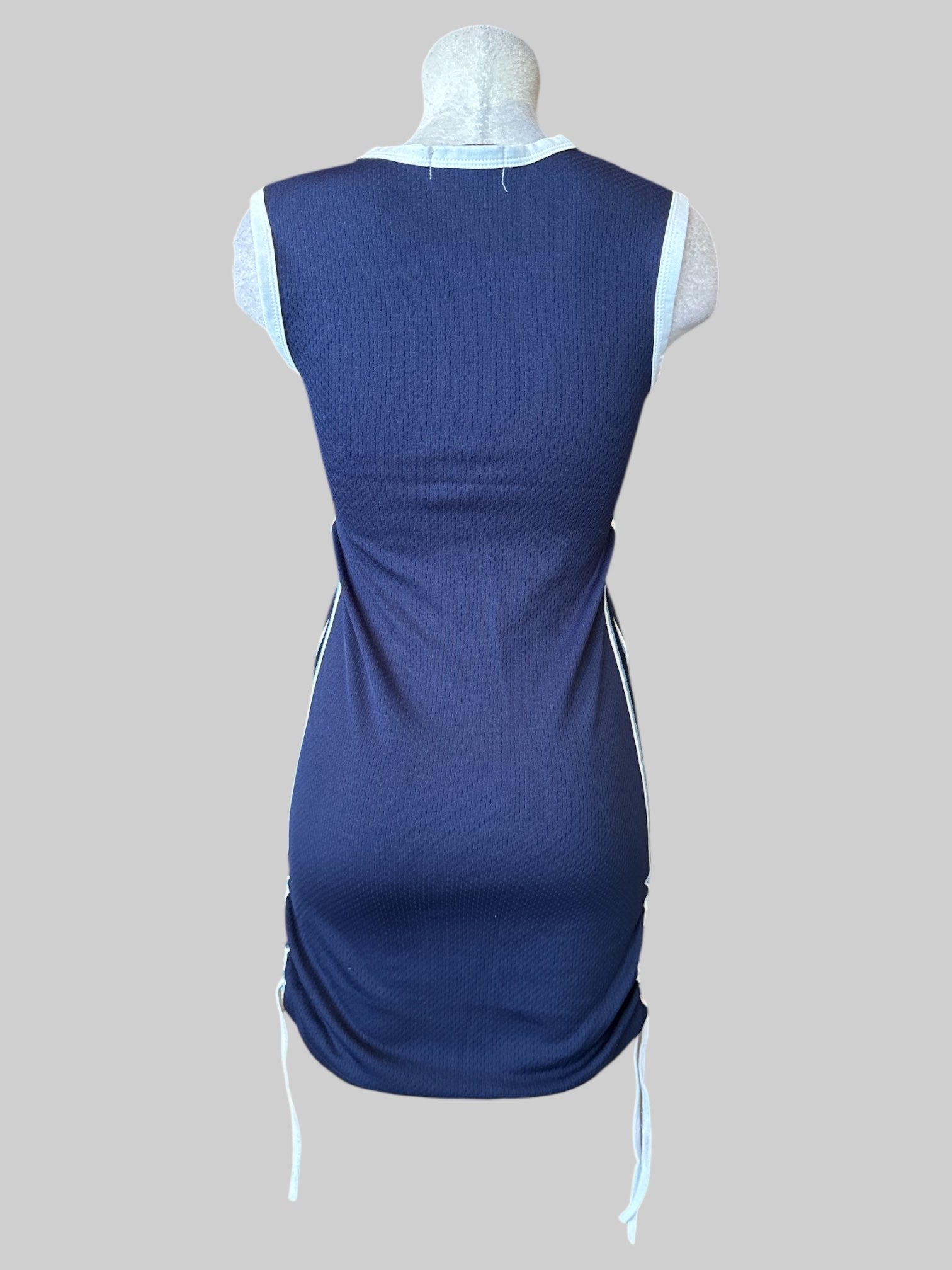 L Vintage navy blue jersey “A Little Naughty 04” dress with drawstring sides