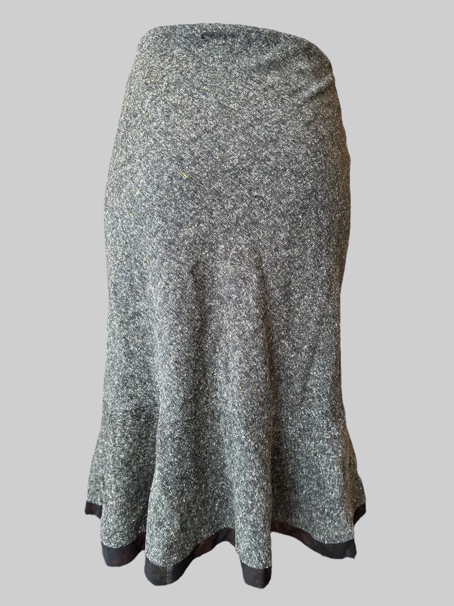 L Vintage grey skirt with speckles of yellow and red, white floral embroidery, and black trim