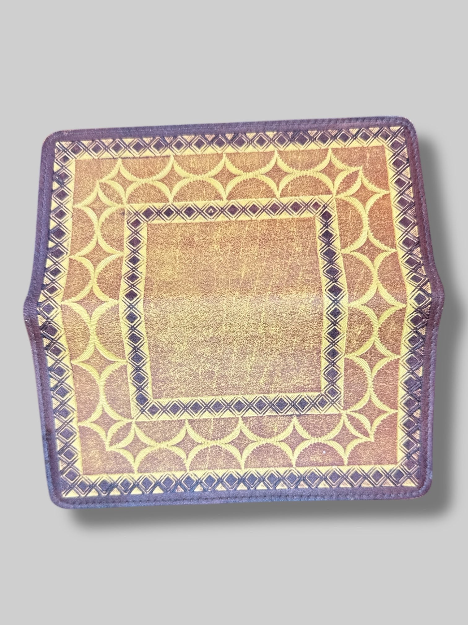 Genuine leather wallet with brown and tan geometric pattern