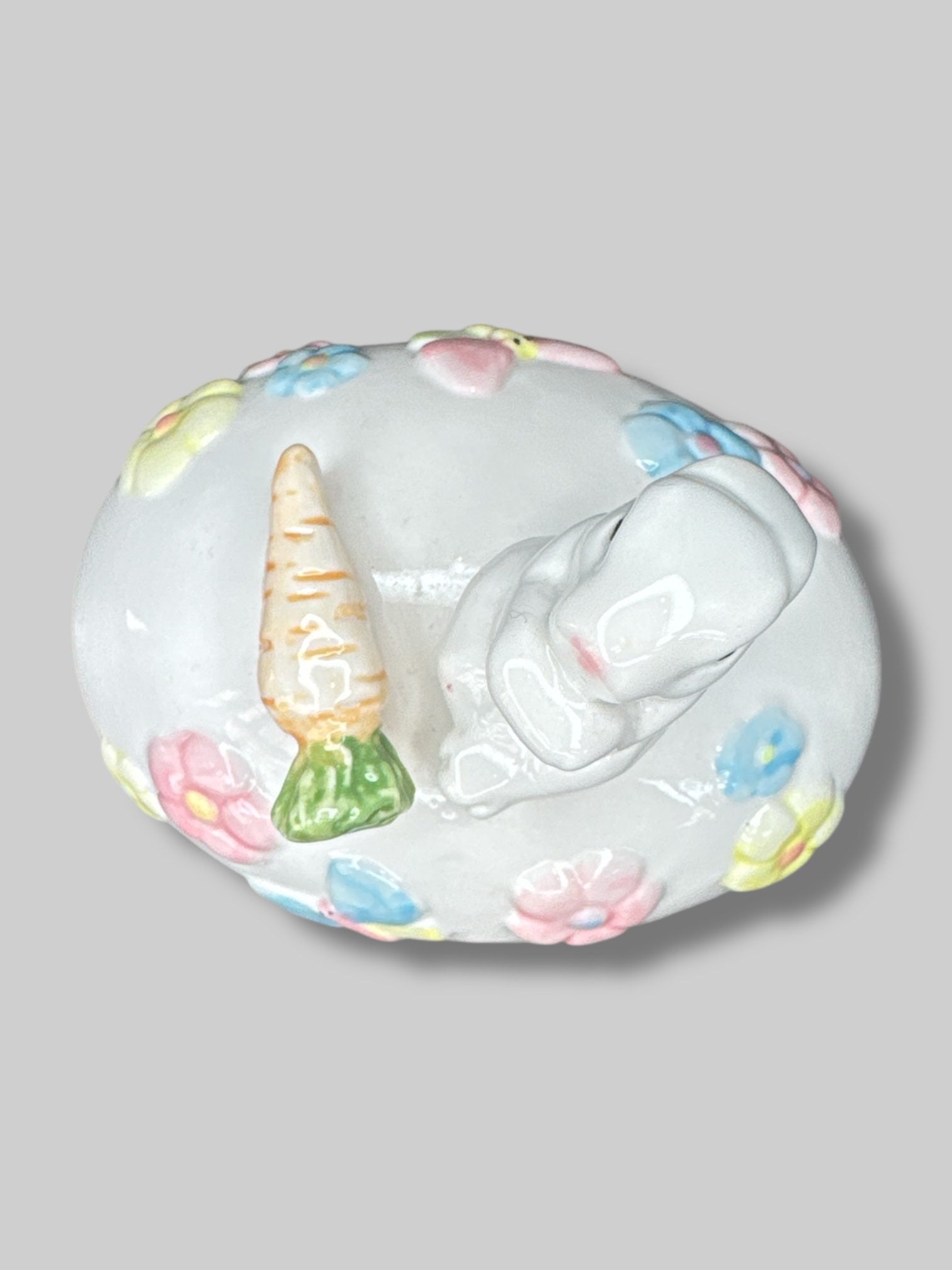 Vintage white egg shaped container with a bunny, florals, and a carrot