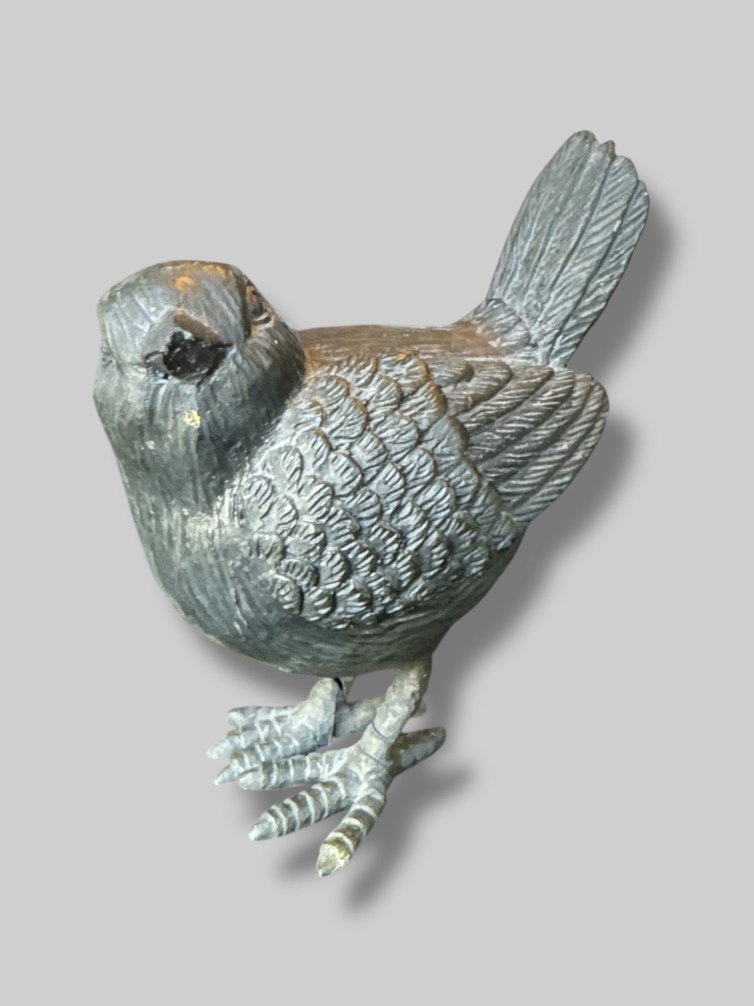 Solid black crow figurine