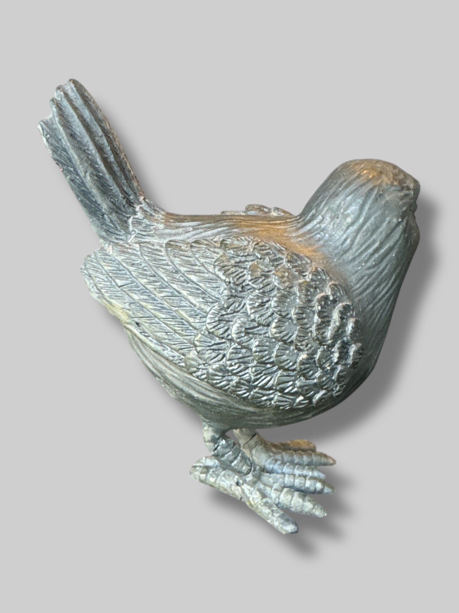 Solid black crow figurine