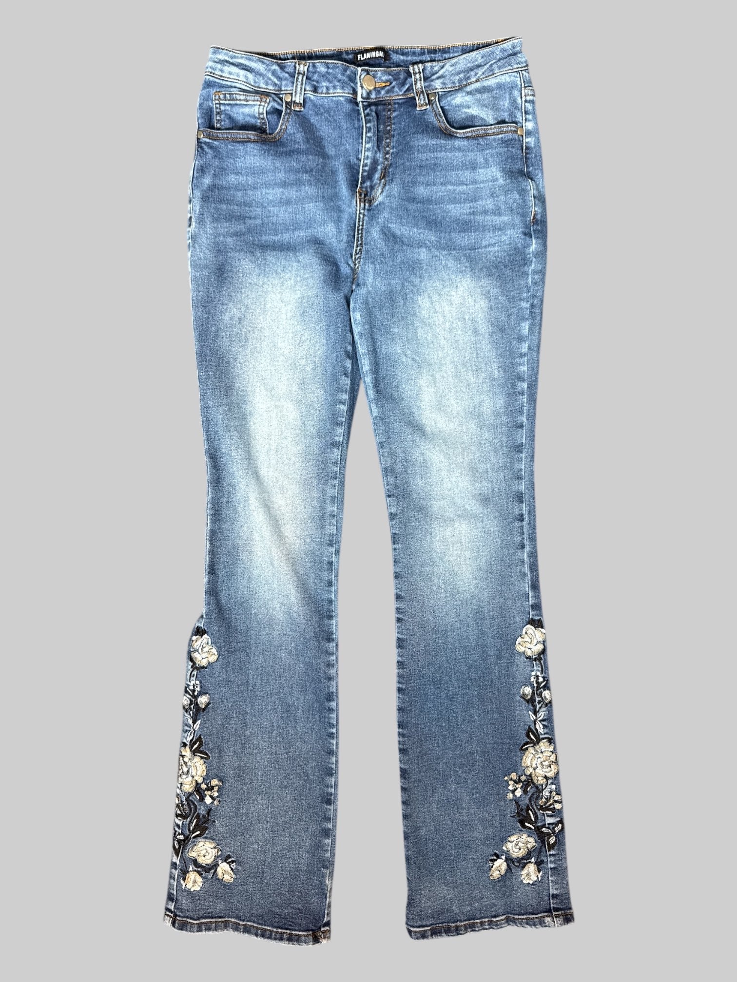 L Blue jeans with floral embroidery on bottoms