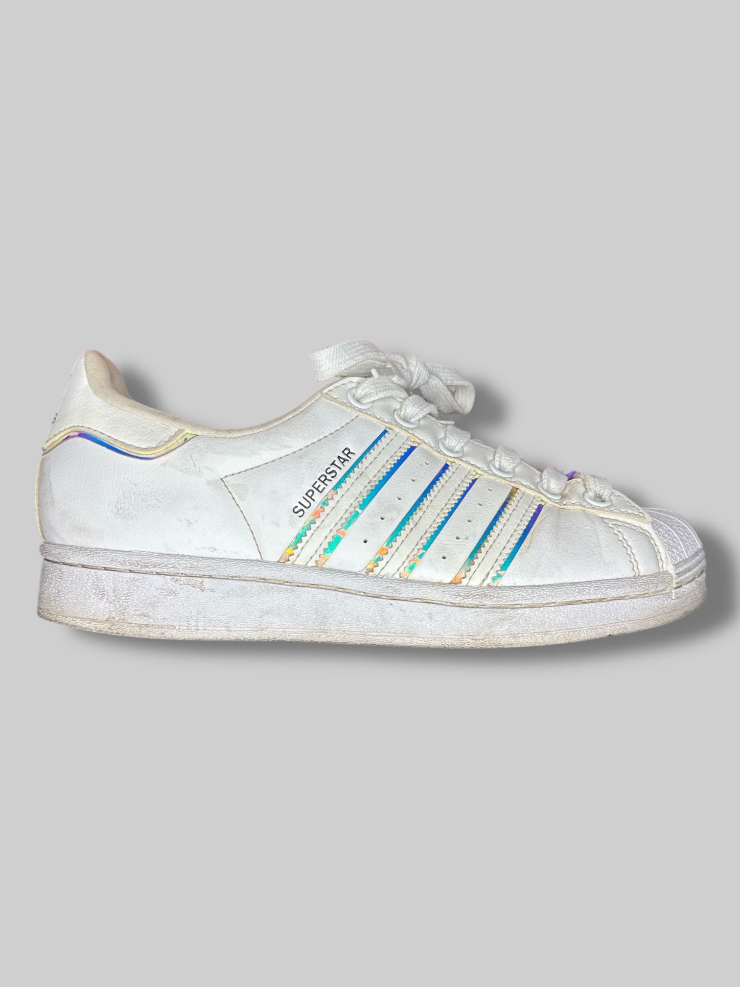 Size 5 1/2 White Adidas sneakers with holographic details, and festival beading on laces