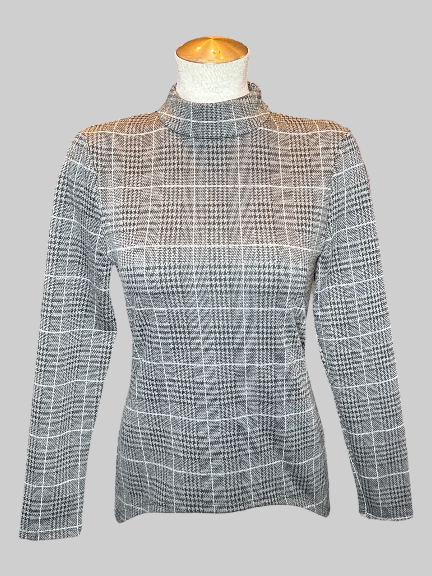 L Black, grey, and silver metallic plaid and houndstooth patter long sleeve top with mock neck, and zipper in back