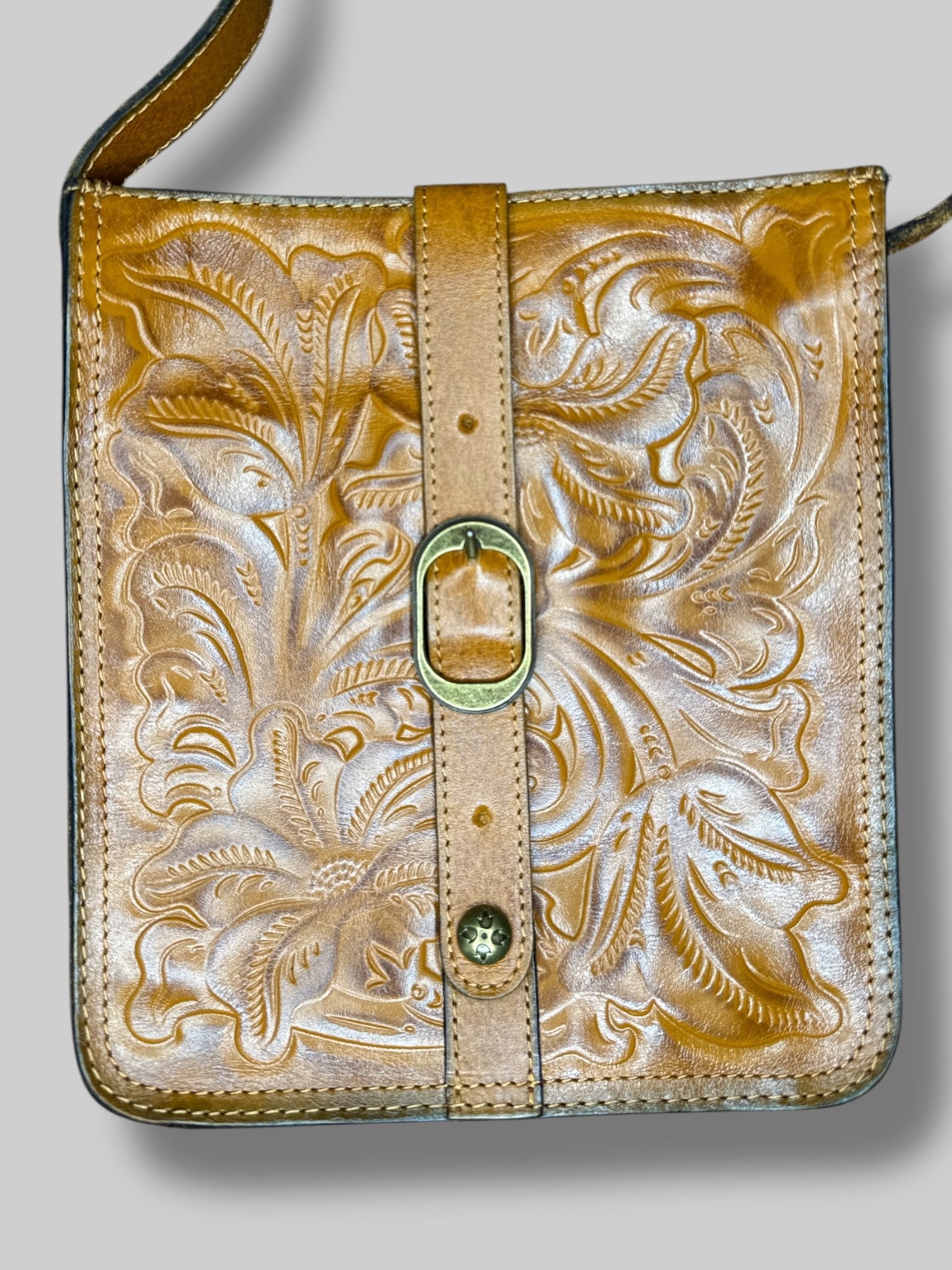 Genuine leather bag with adjustable straps and florals