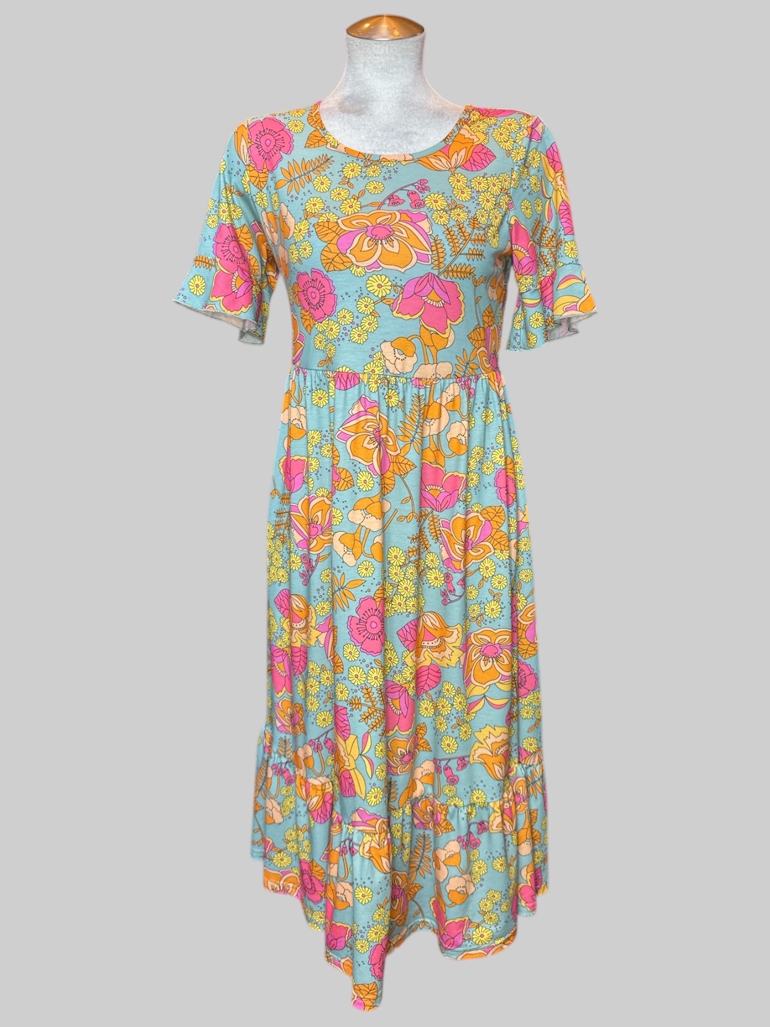 M blue flowy maxi dress with orange, pink, and yellow florals