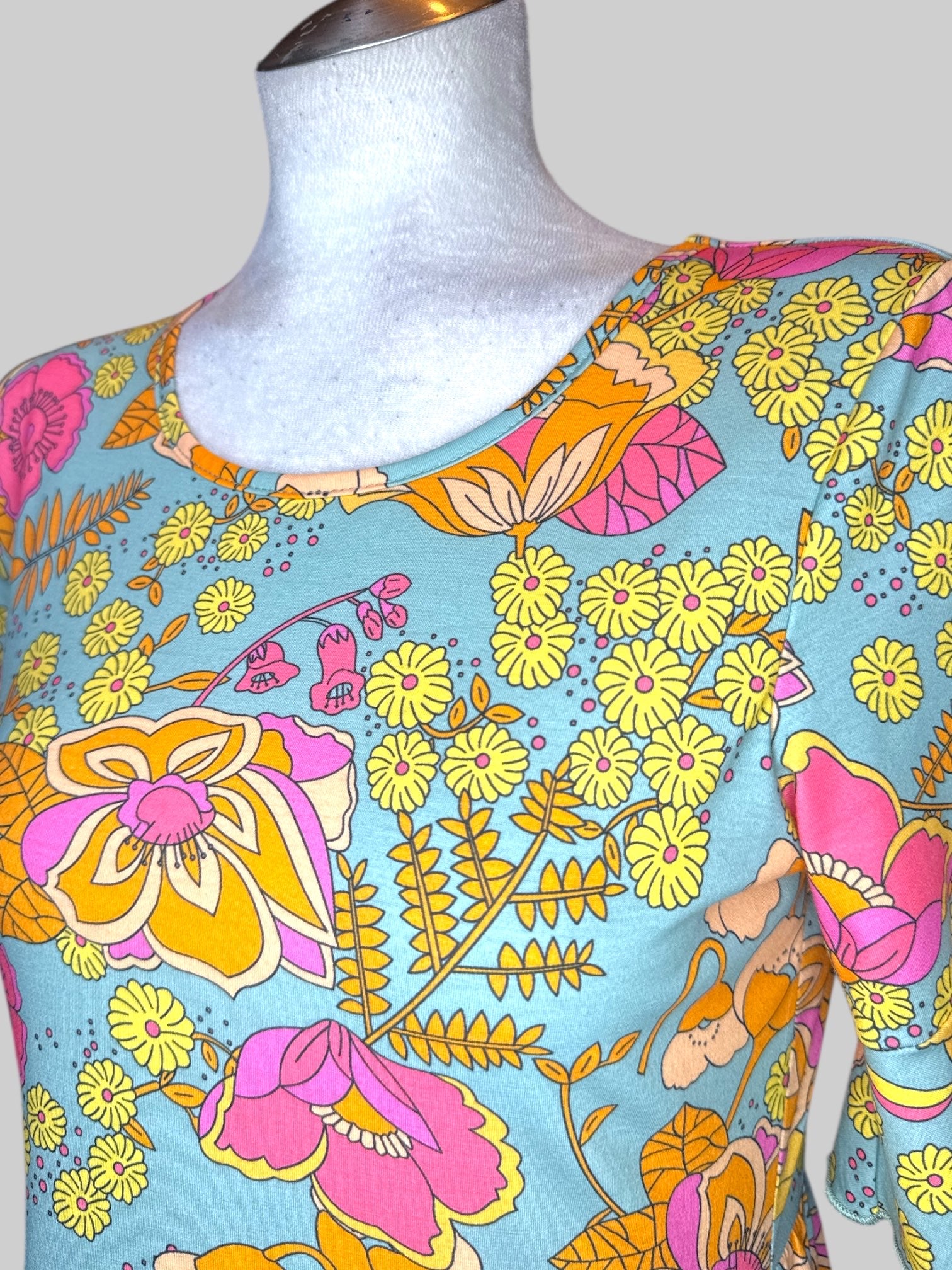 M blue flowy maxi dress with orange, pink, and yellow florals