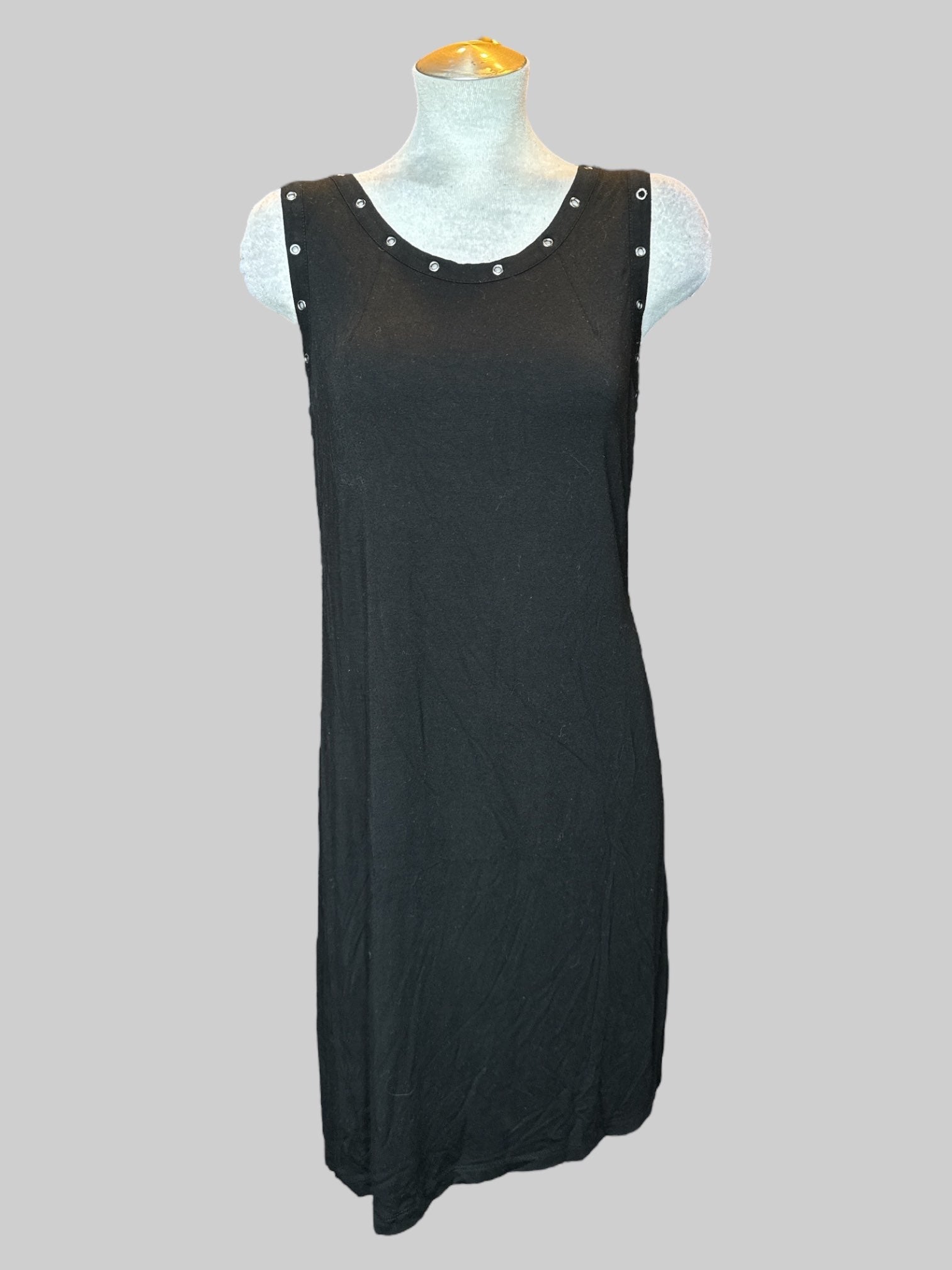 0X black dress with grommets around the arms
