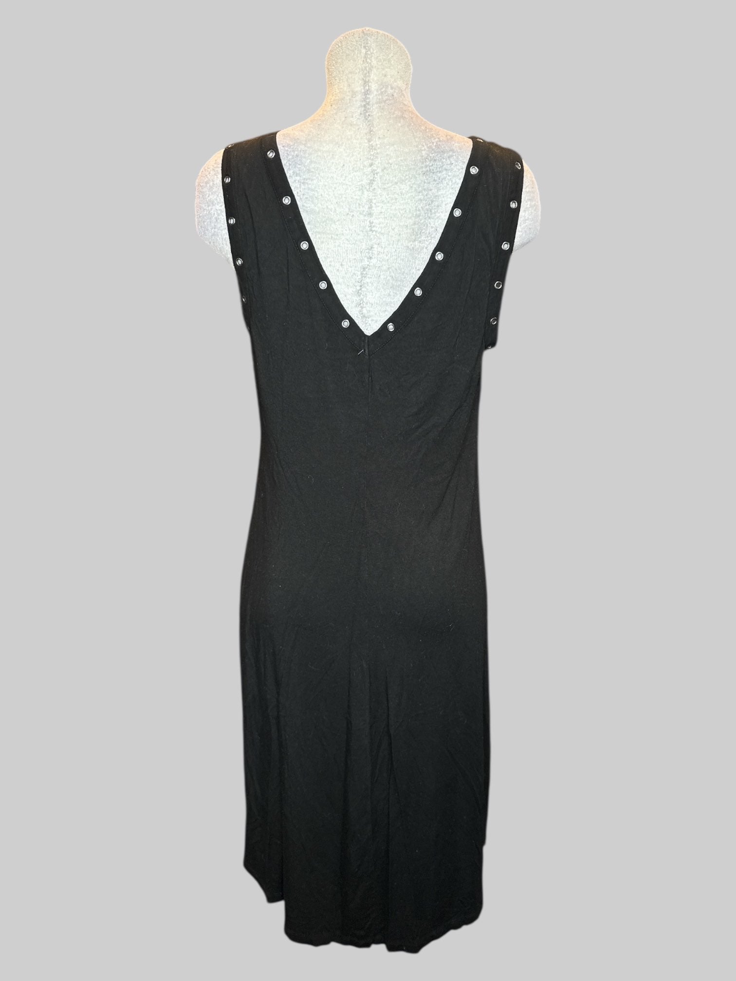 0X black dress with grommets around the arms
