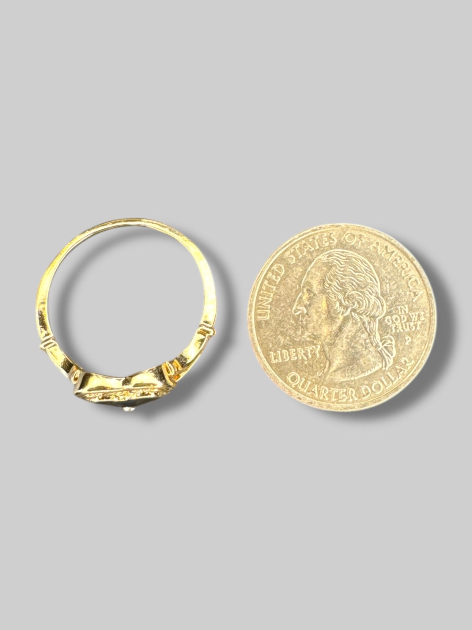 Size  gold color ring with heart