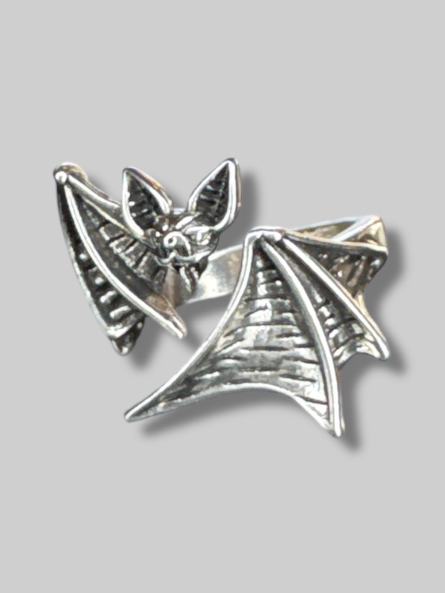 Adjustable silver color bat ring