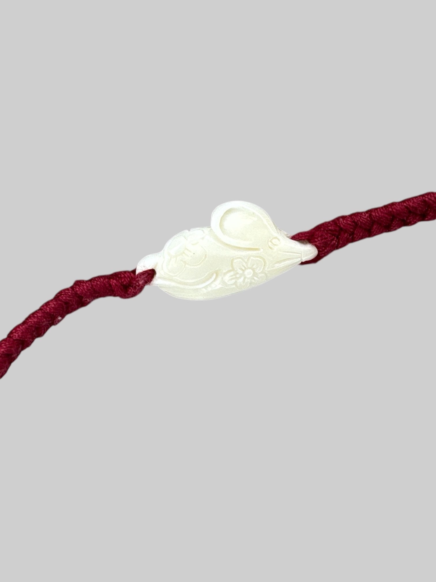 red mouse with carvings bracelet