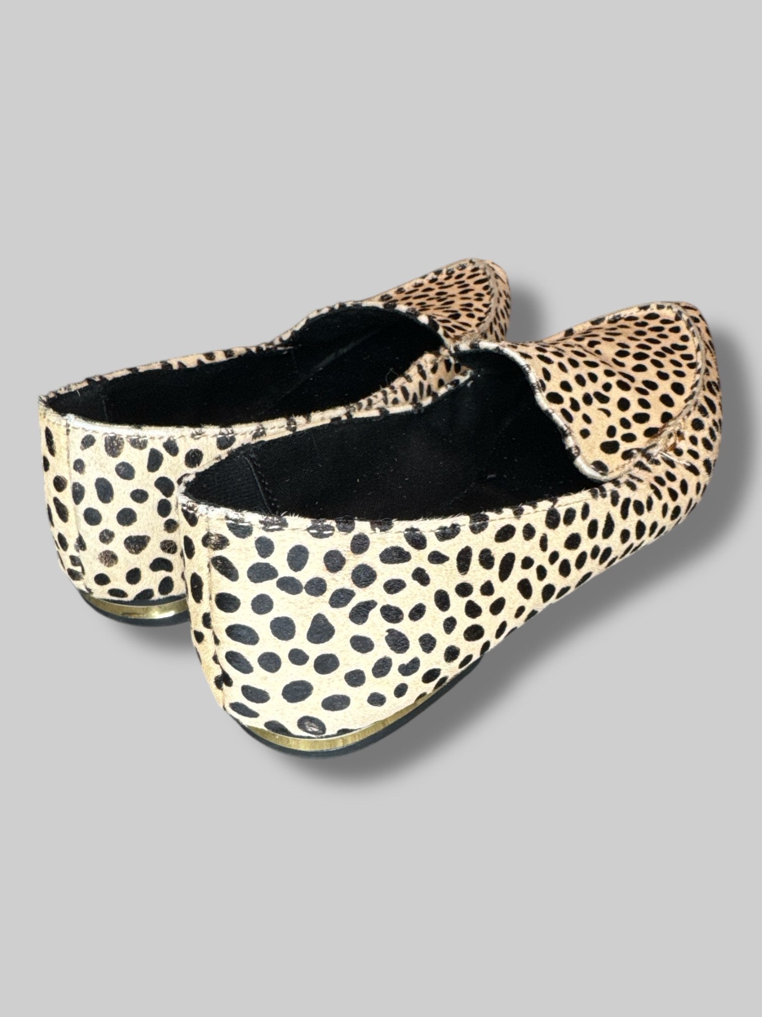 Size 10 animal print flats with real animal fur