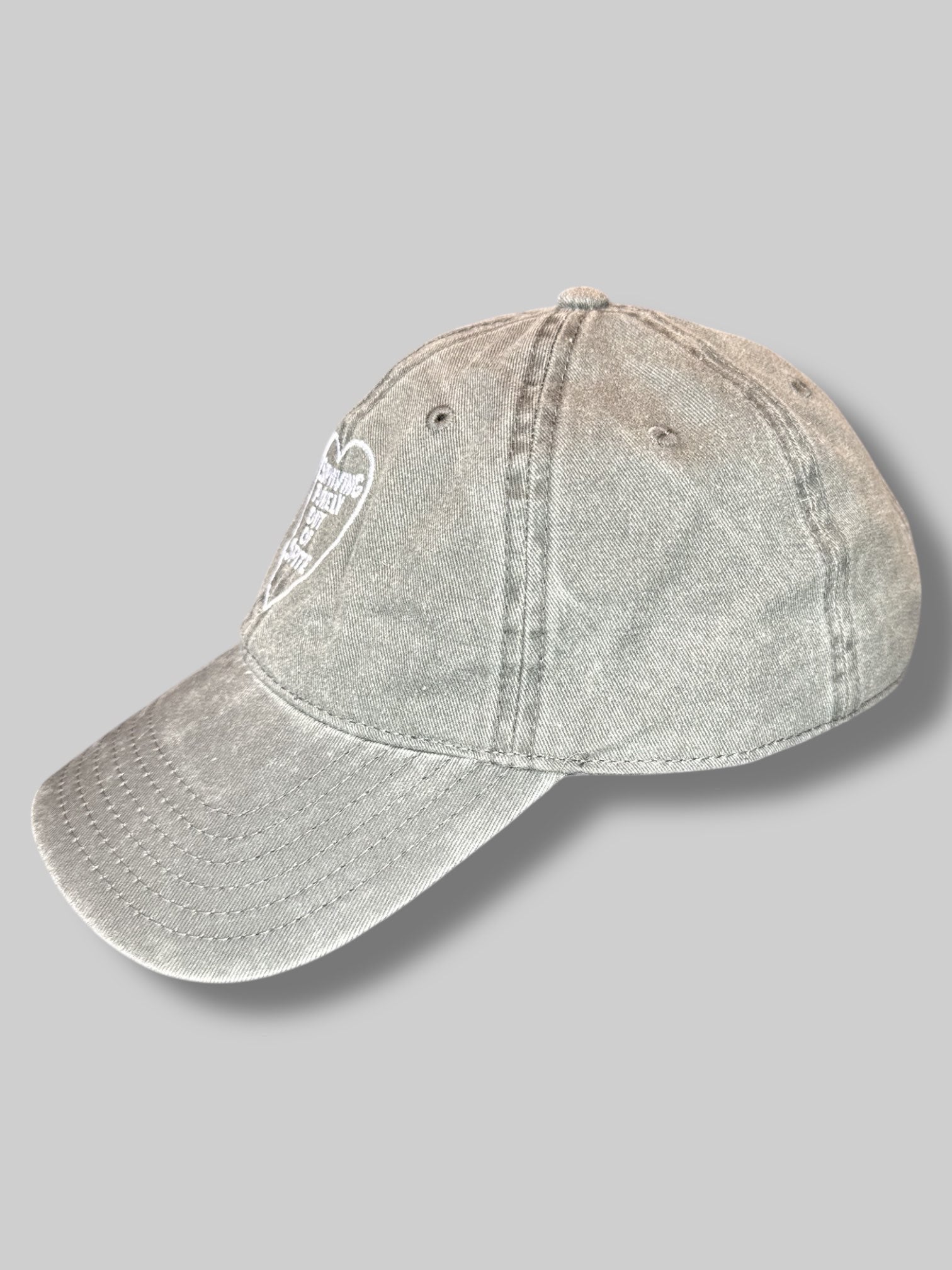 Acid wash gray surviving purely out of spite baseball cap