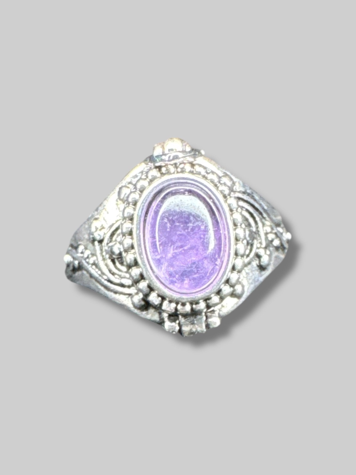 Adjustable size amethyst poison ring