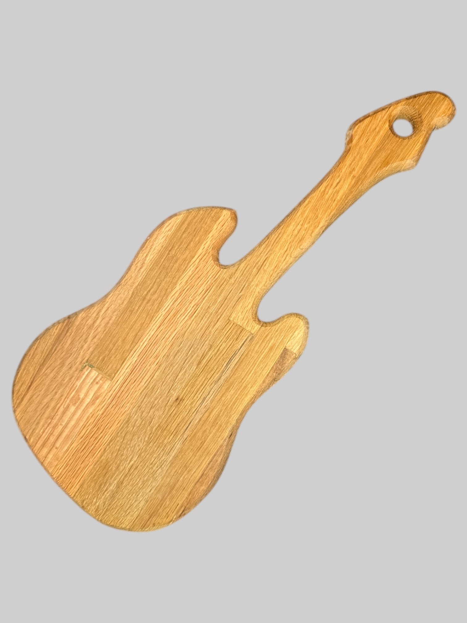 Wooden guitar shaped cutting board