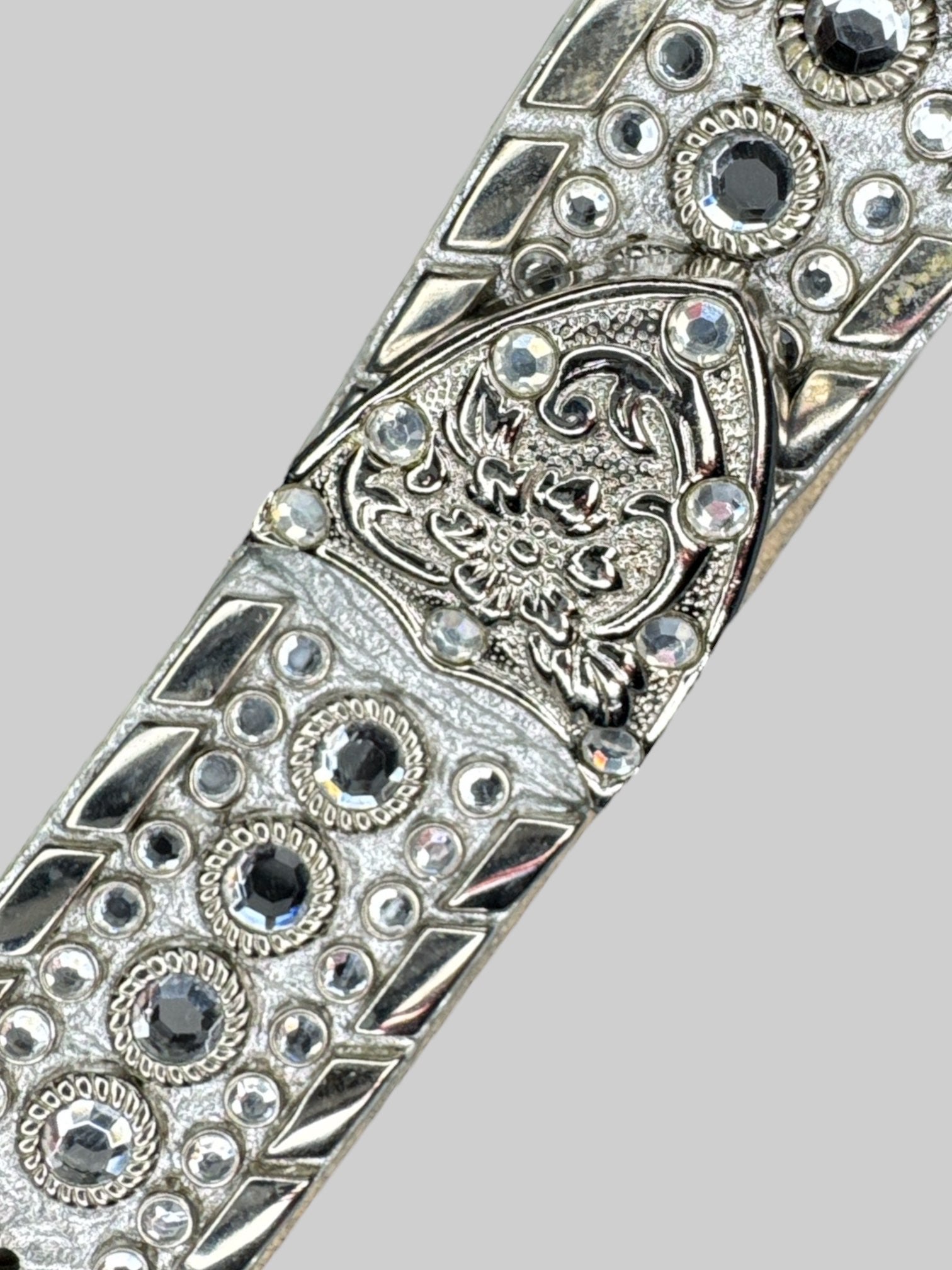 Vintage silver tone belt with reflective studs and beautiful belt buckle