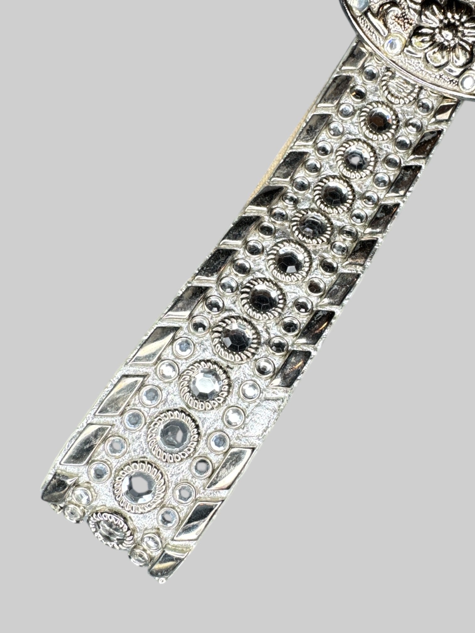 Vintage silver tone belt with reflective studs and beautiful belt buckle
