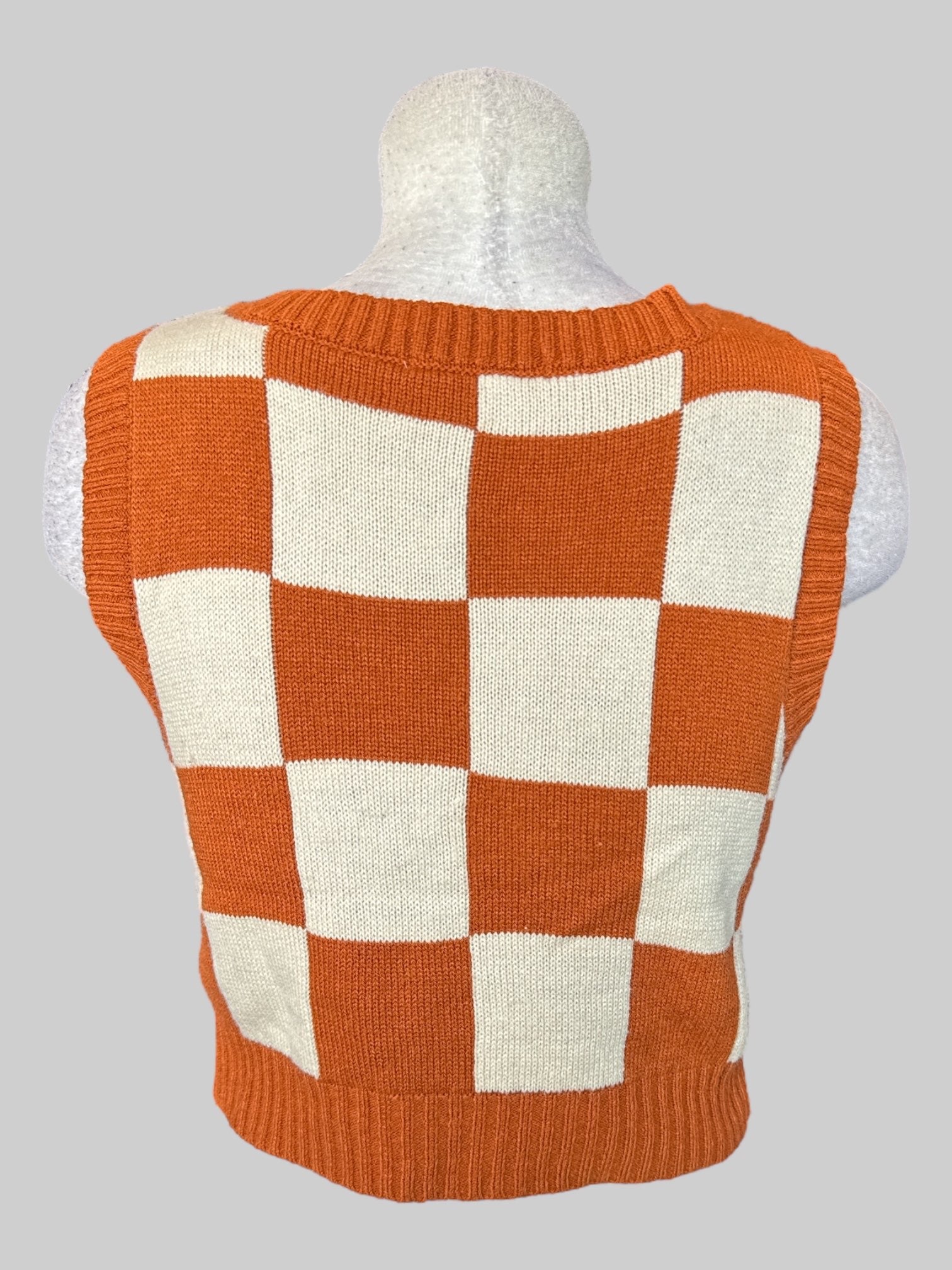 S Brownish orange and cream color checkered sweater vest