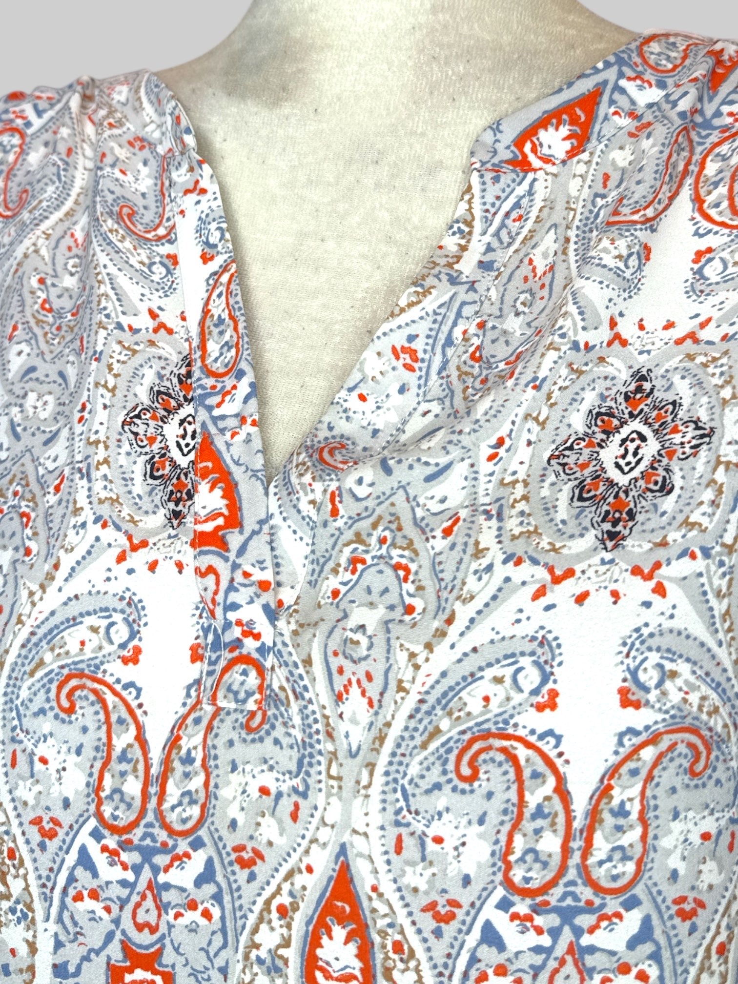 3X flowy white top with multicolor paisley and geometric patterns