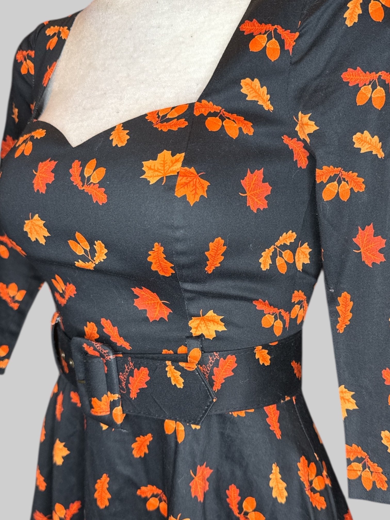 XS NWT Collectif black swing dress with orange leaves and belt