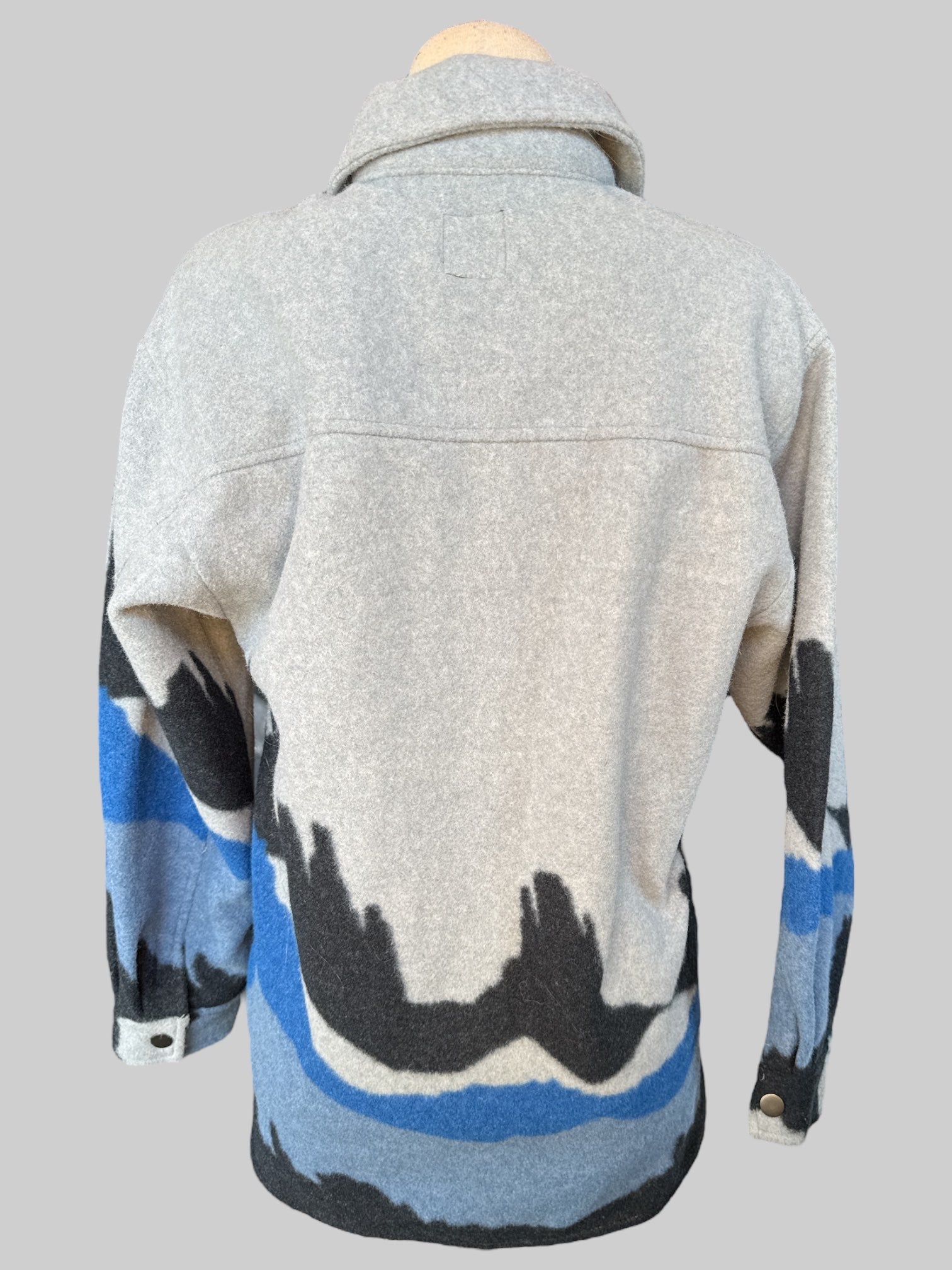 M NWT Greyish blue snap button coat with black, white, and blue pattern