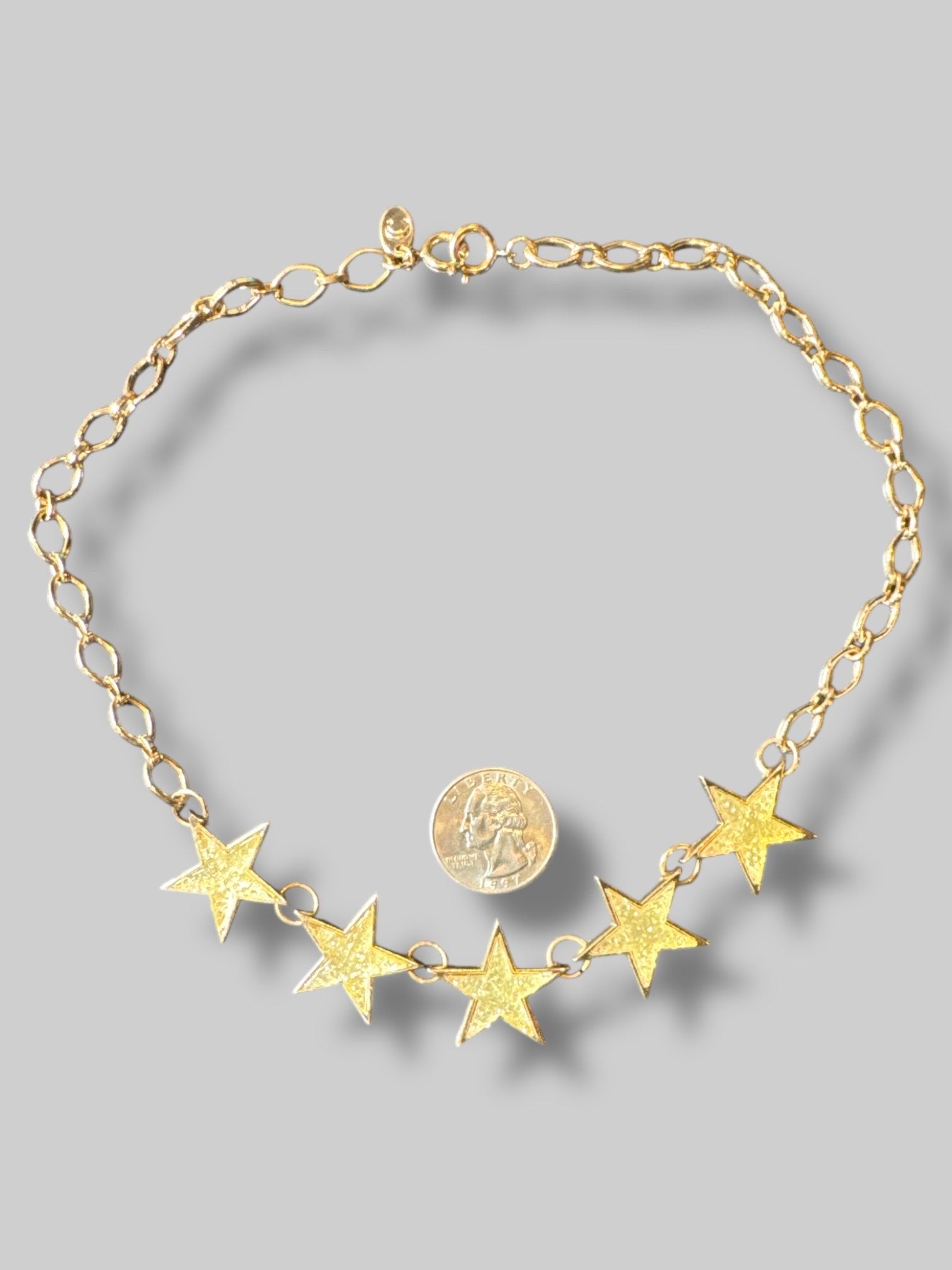 Gold color star necklace