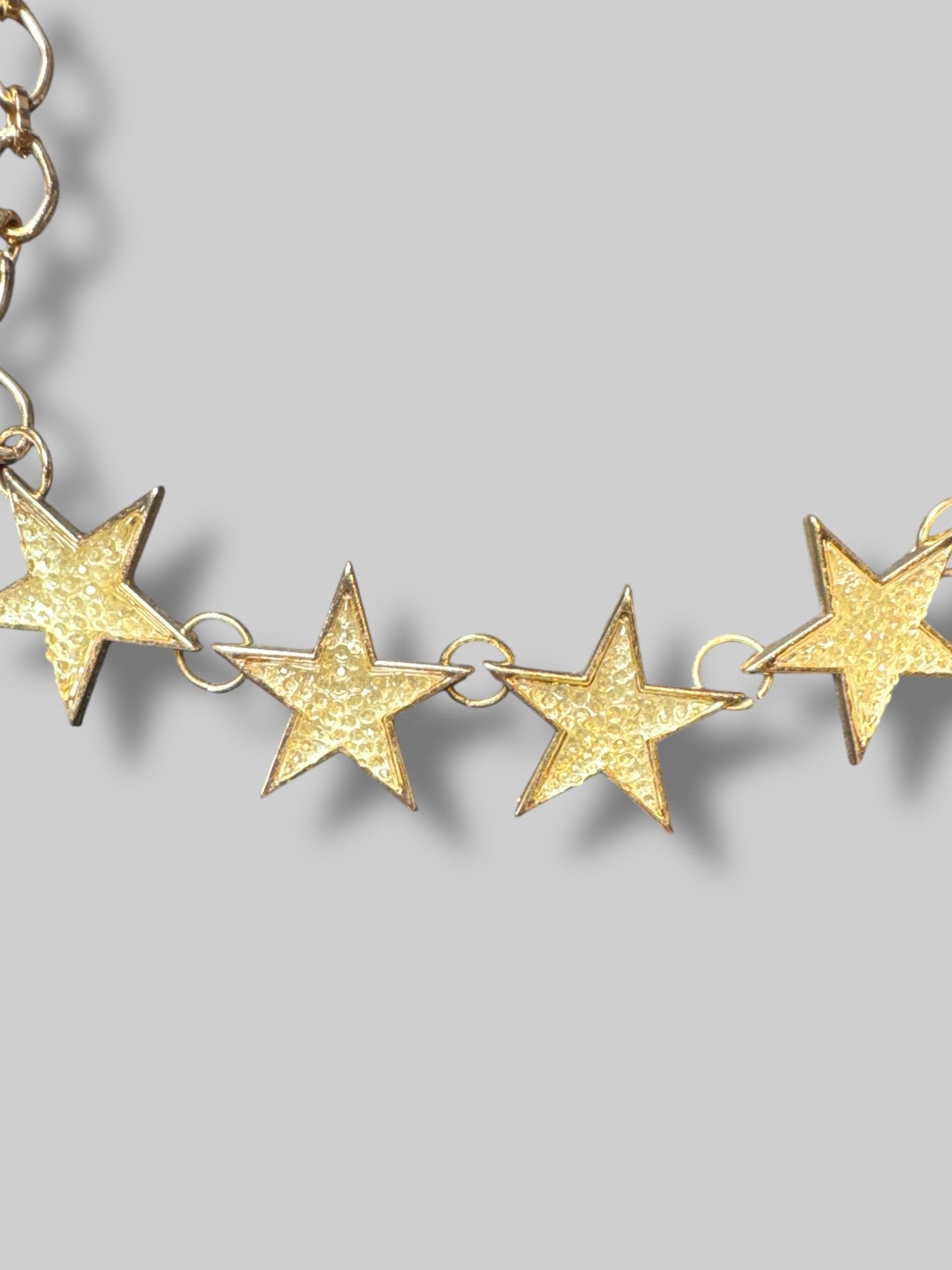 Gold color star necklace