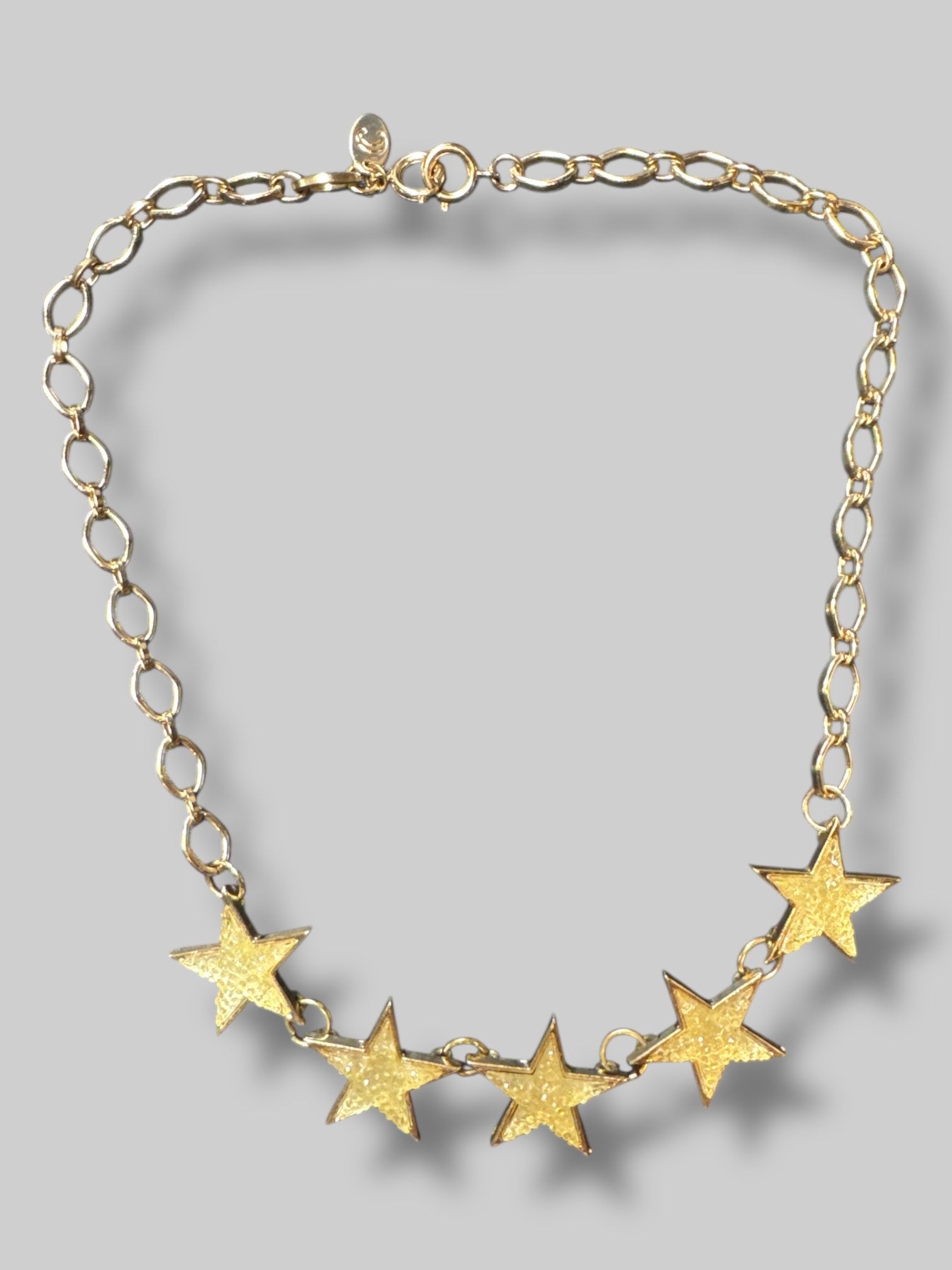 Gold color star necklace