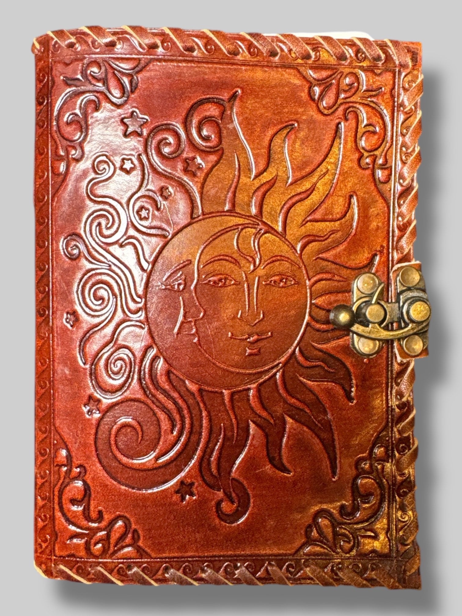 Leather journal with sun and moon design
