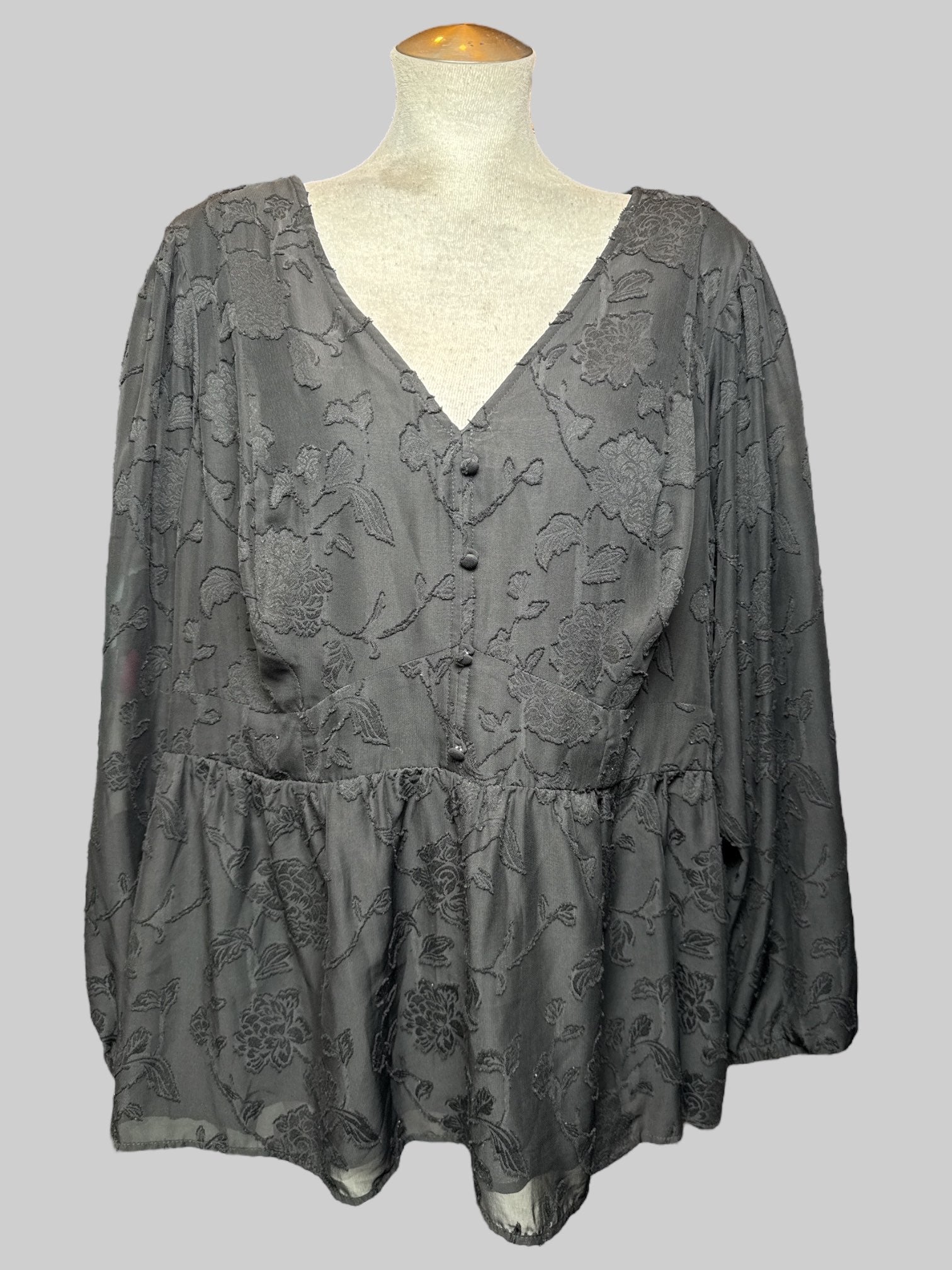 4X black long sleeve blouse with velvet burnout florals, shirred back, and sheer balloon sleeves