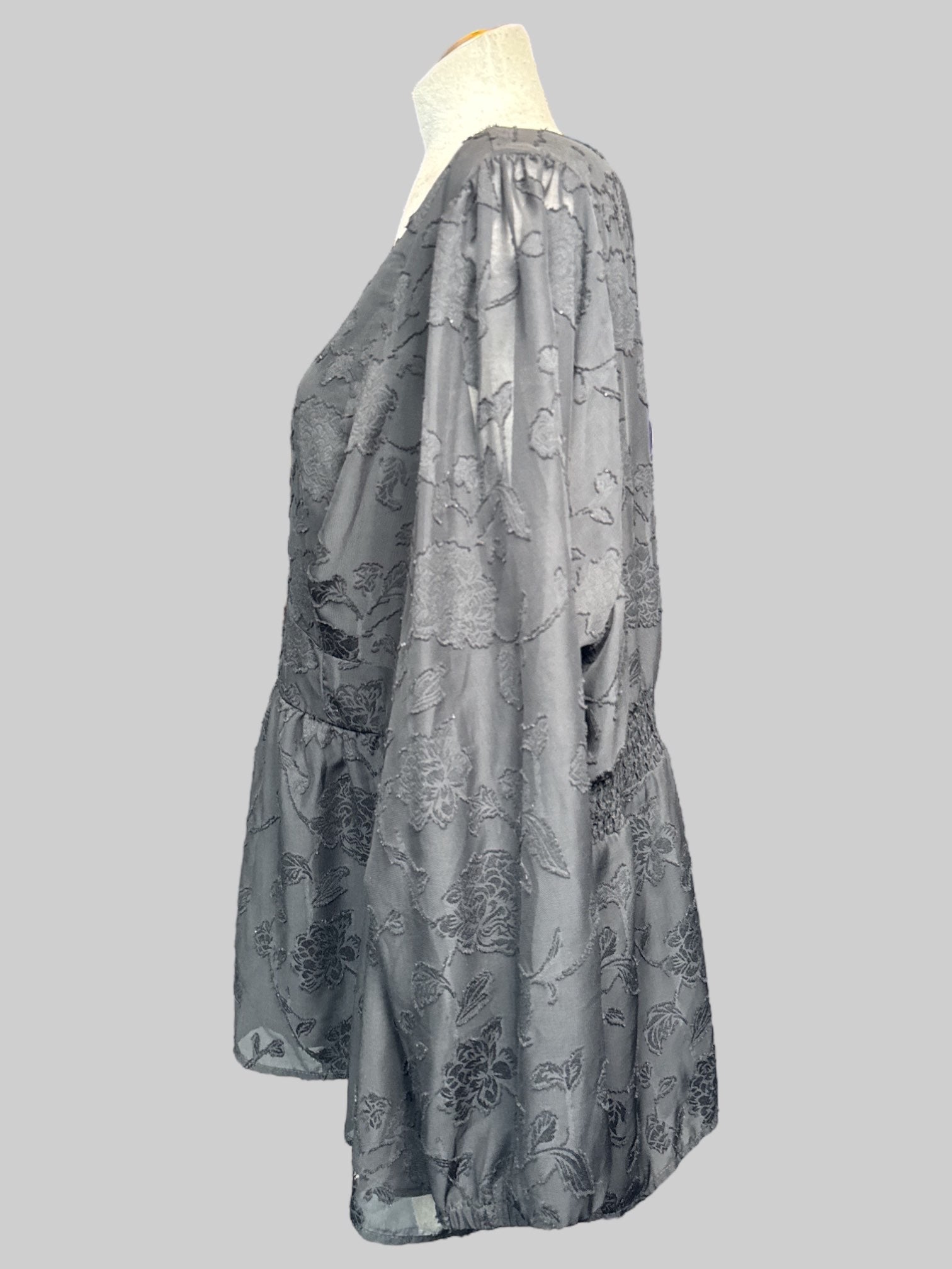 4X black long sleeve blouse with velvet burnout florals, shirred back, and sheer balloon sleeves