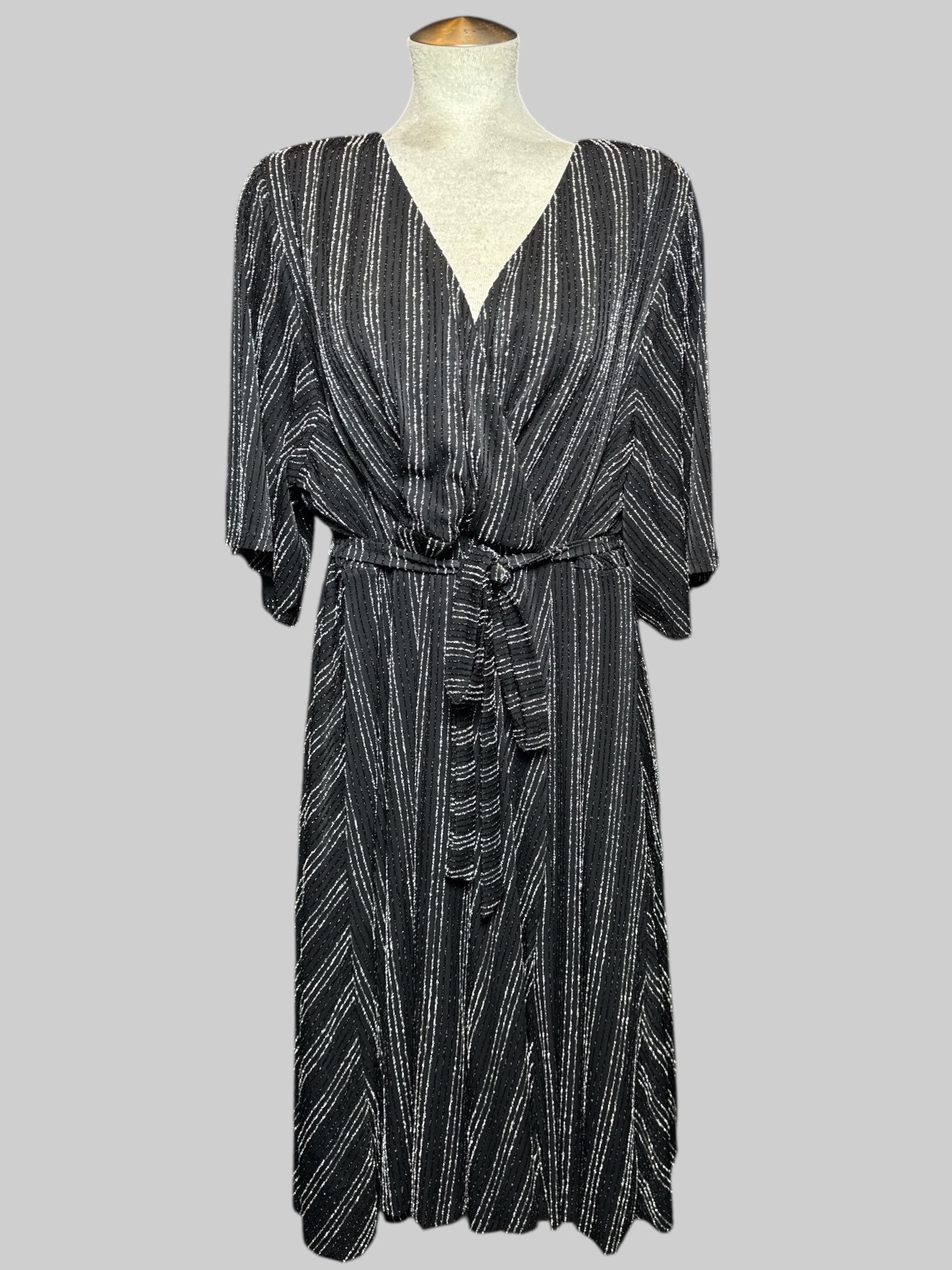 3X black faux wrap dress with black and silver metallic textured stripes and tie belt