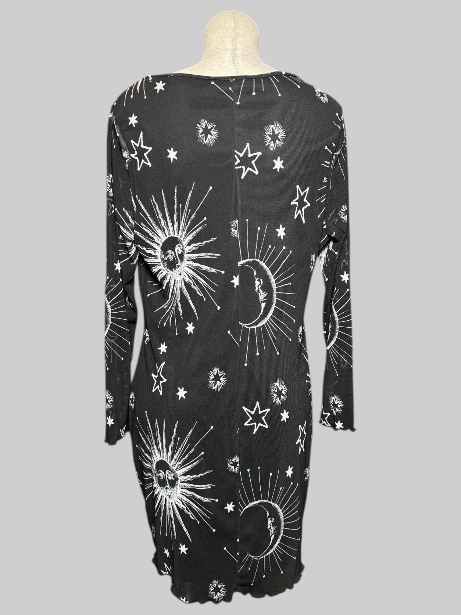 XL black body con dress with white celestial design and sheer long sleeves
