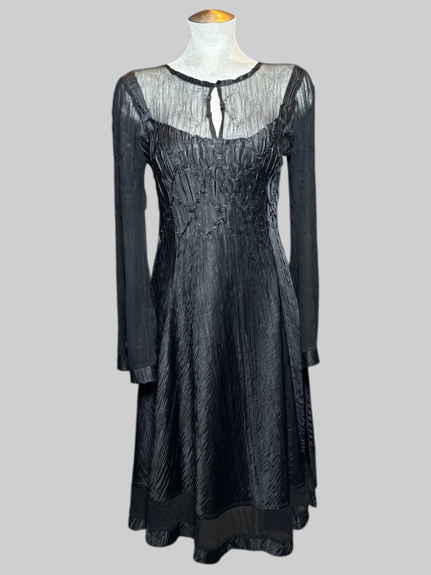 XL Komarov black dress with crinkle texture and sheer sleeves and chest