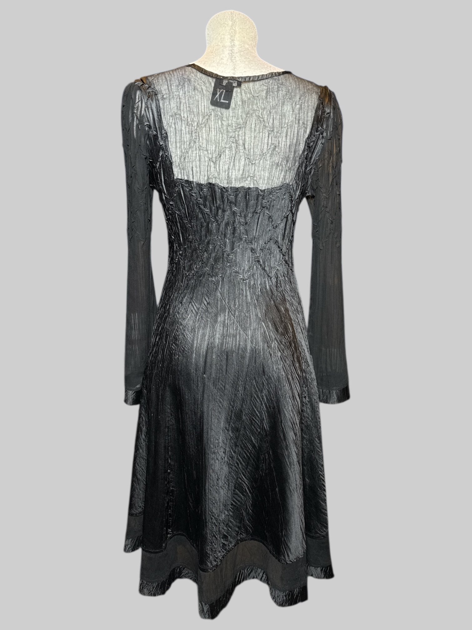 XL Komarov black dress with crinkle texture and sheer sleeves and chest
