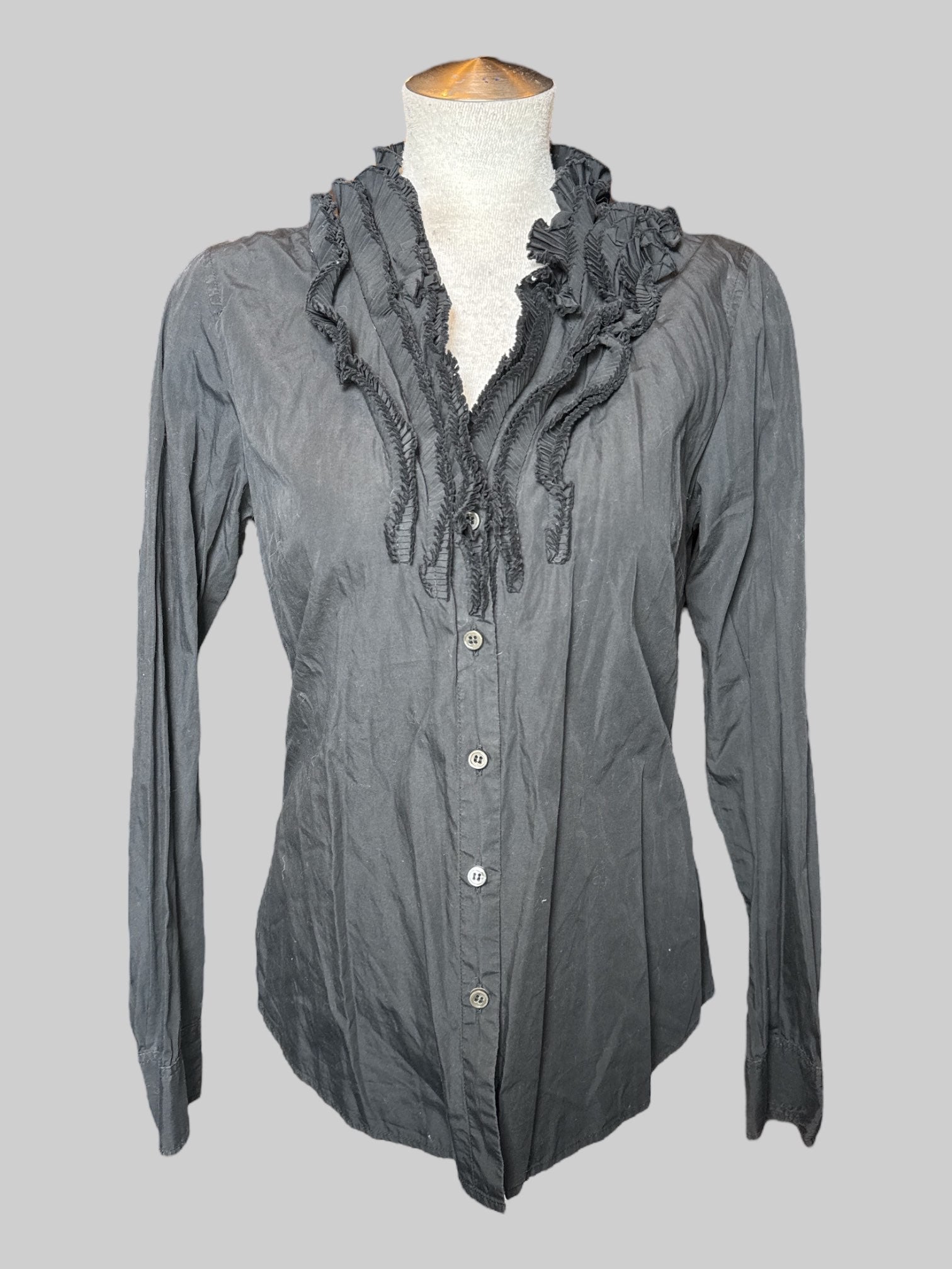 M black, long sleeve button down top with multi layer, pleated ruffle neckline