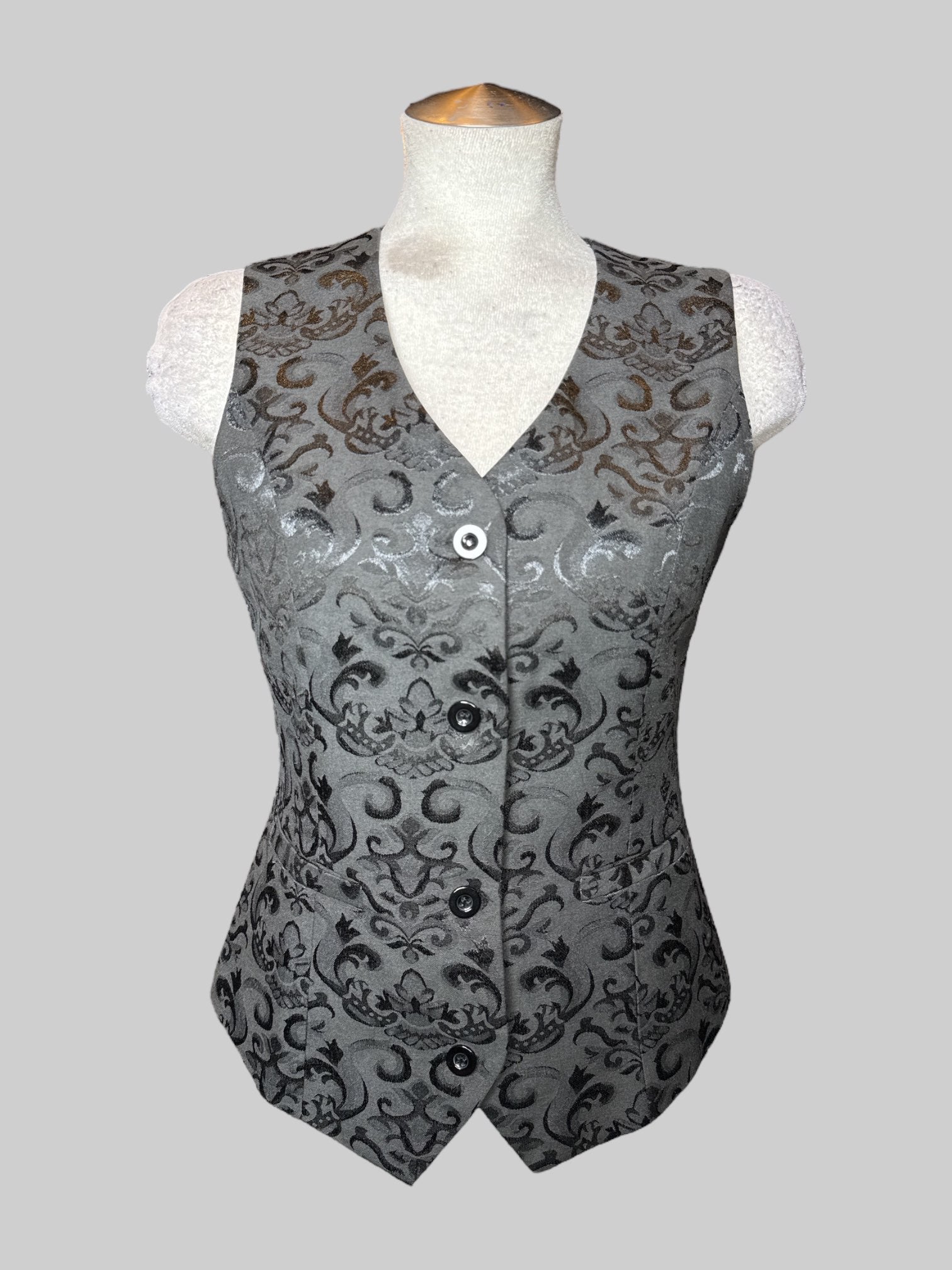 M black vest with ornate embroidered filigree