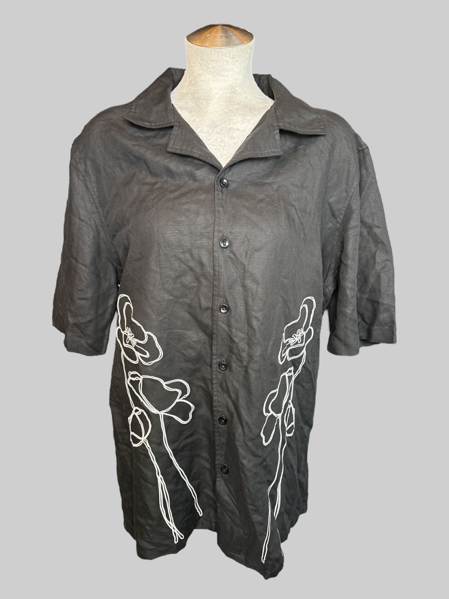 XL black short sleeve button down with white floral embroidery on front