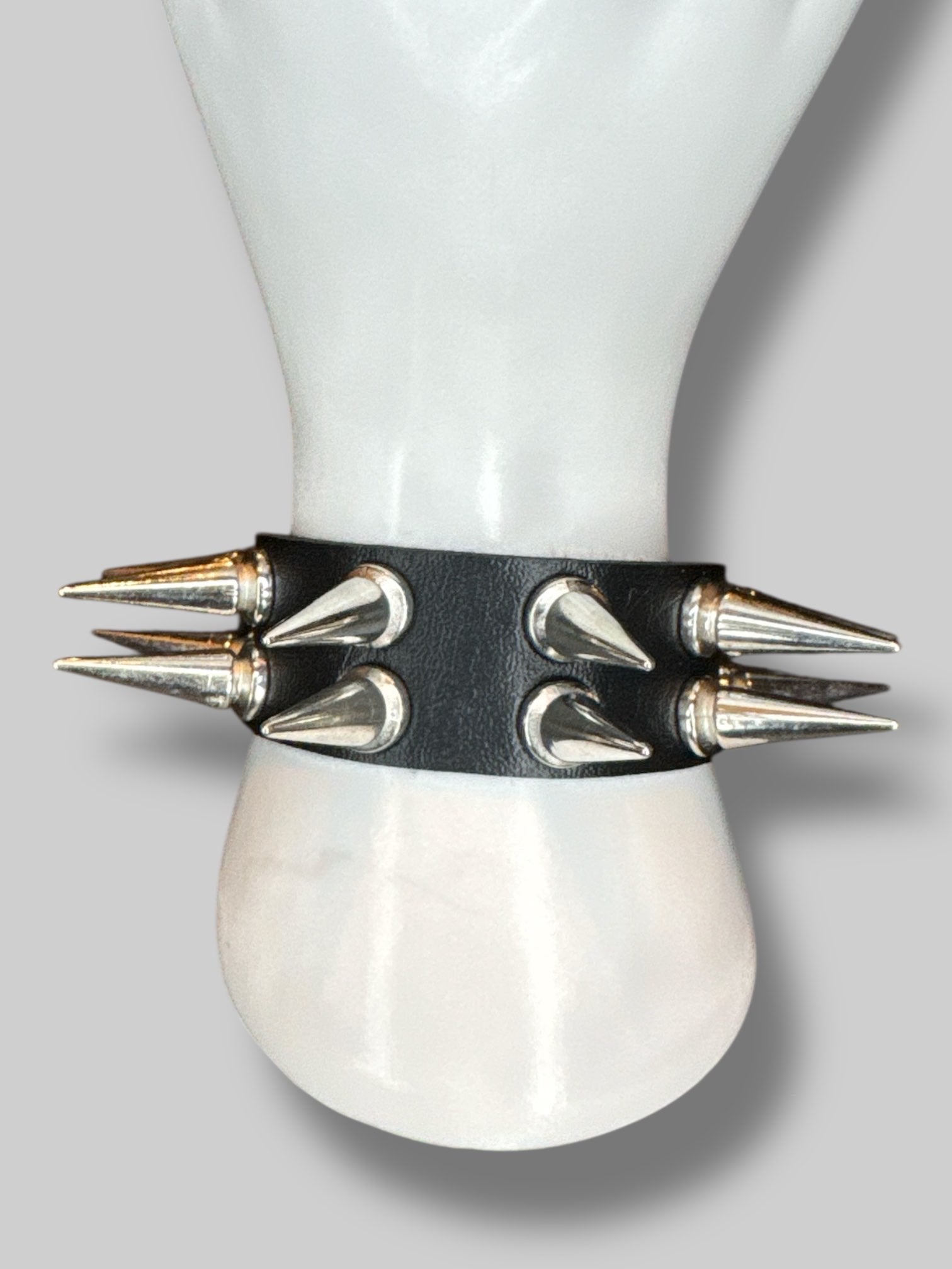 Black leather studded bracelet with buckle