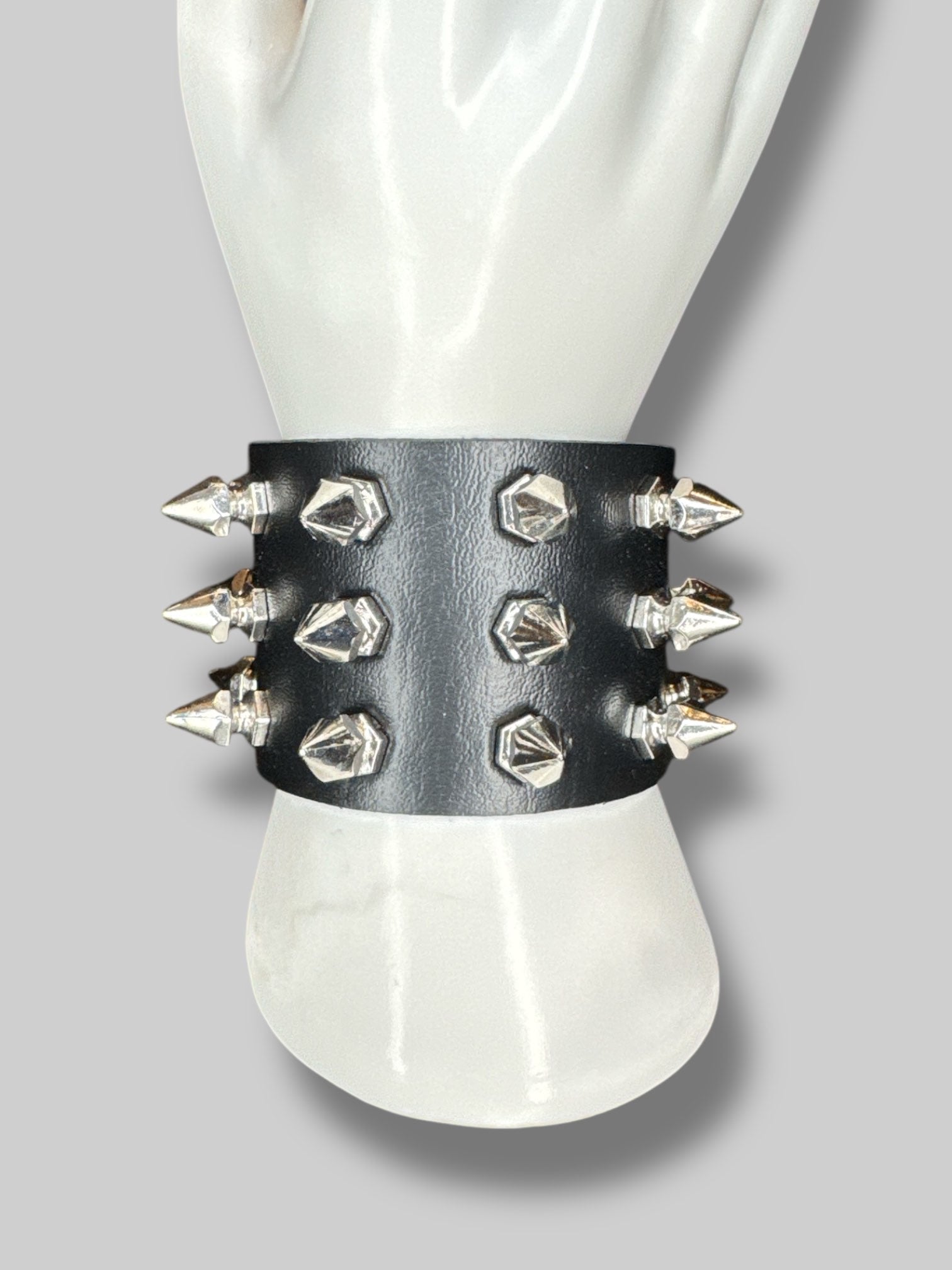 Black leather bracelet with snap buttons