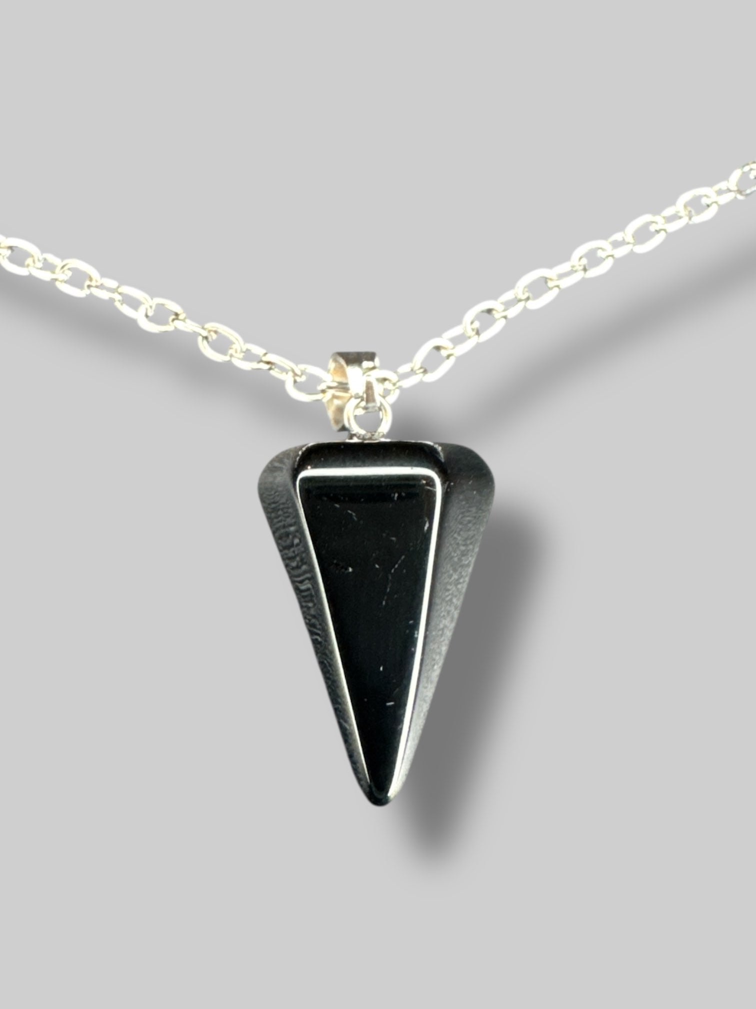 Black pendulum necklace with silver tone chain