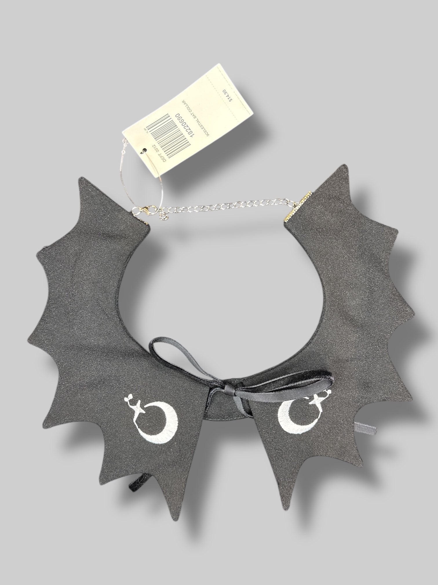 NWT black batwing shaped collar necklace with white moon and star embroidery, and Velvet bow on the front