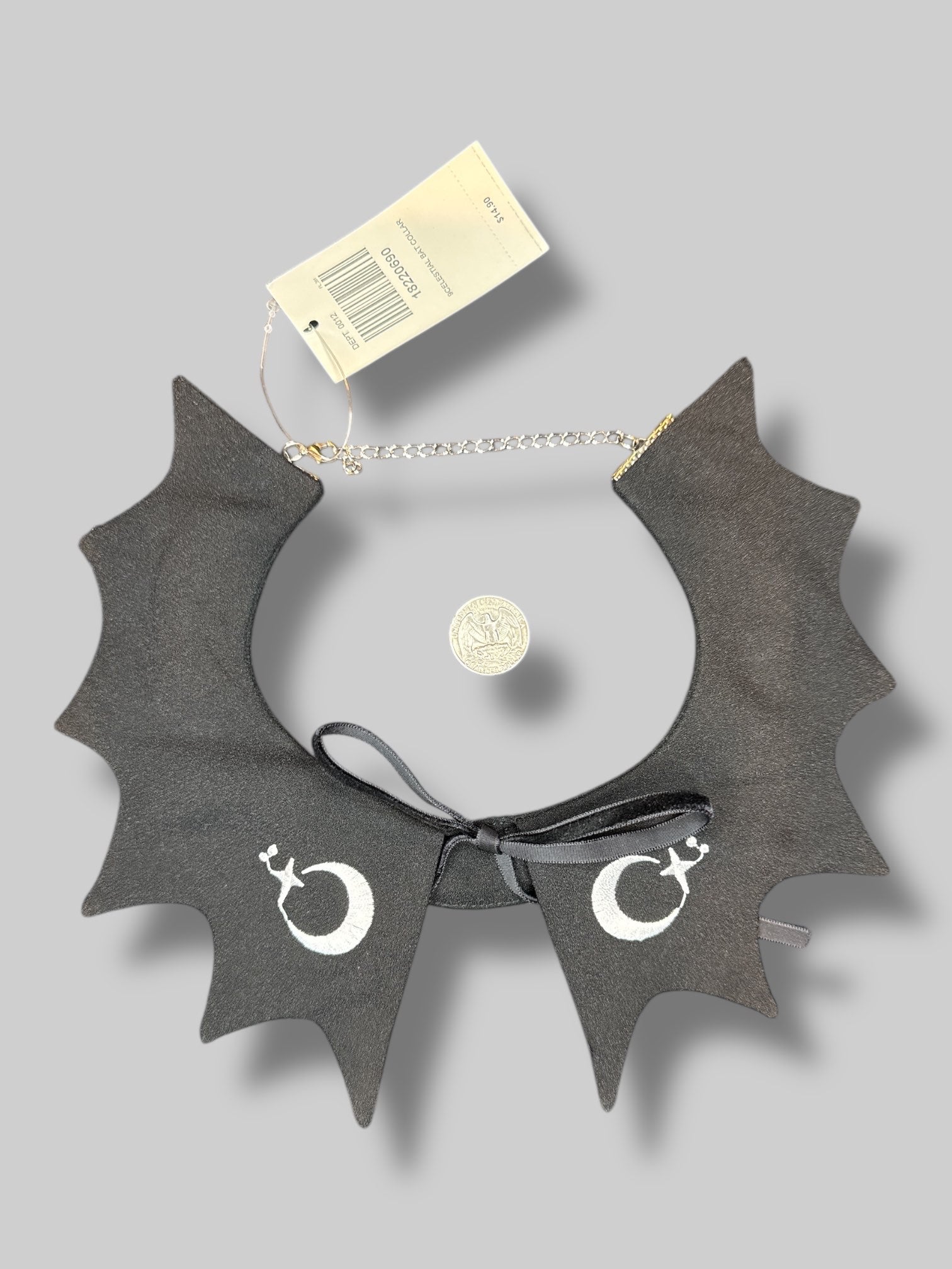 NWT black batwing shaped collar necklace with white moon and star embroidery, and Velvet bow on the front