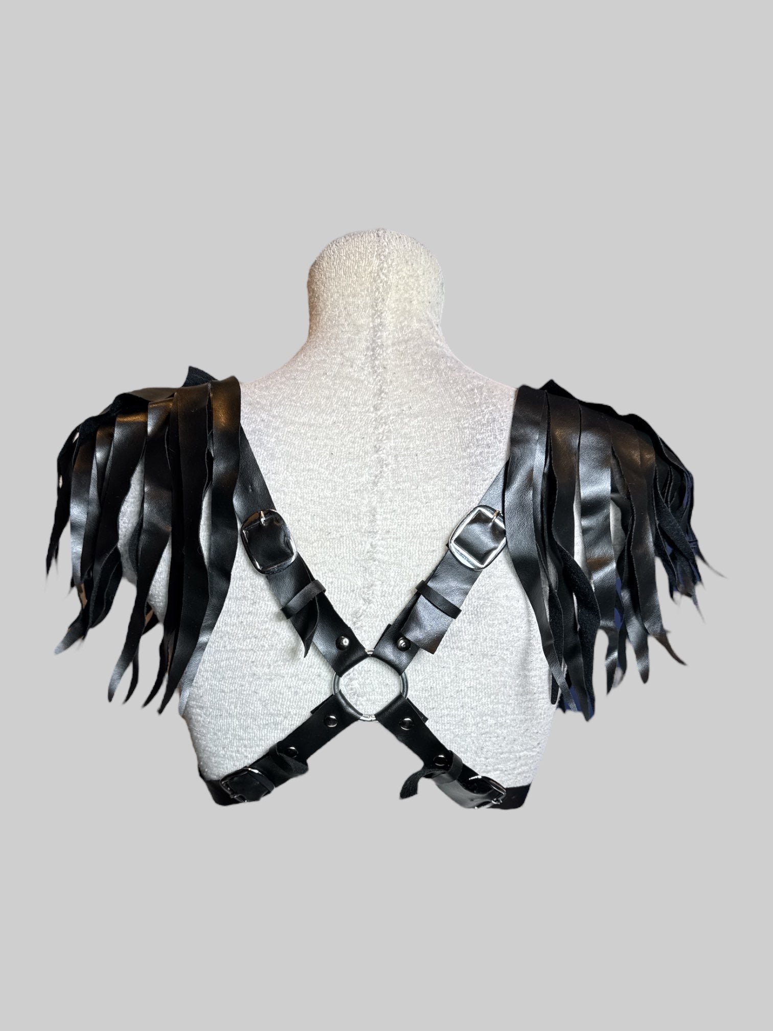 NWT Black leather harness with tassel, shoulder pads, and adjustable buckles on back
