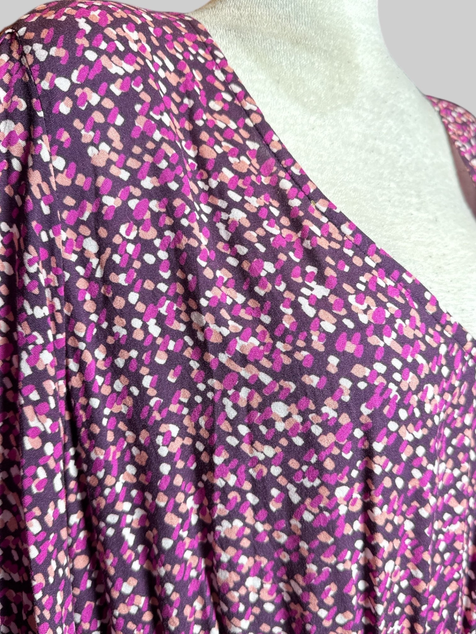 3X purple dress with pink, orange, and white geometric pattern, shirred waist, and shirred cuffs